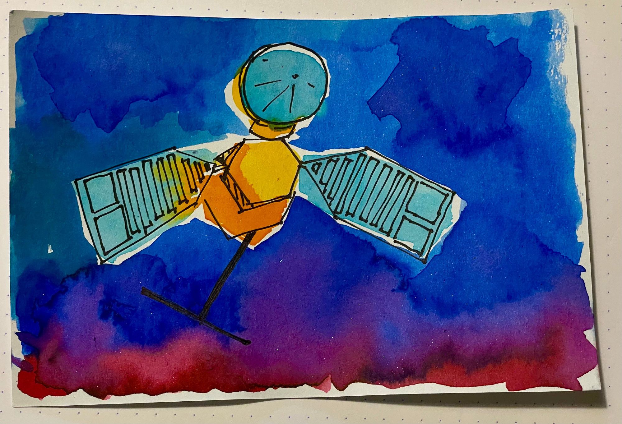 an index card with a watercolor and pen sketch of the Mars Reconnaissance Orbiter. The background is a magenta-to-blue gradient with a few flakes of metallic sparkle and the spacecraft is orange with blue solar arrays and a blue circular antenna.