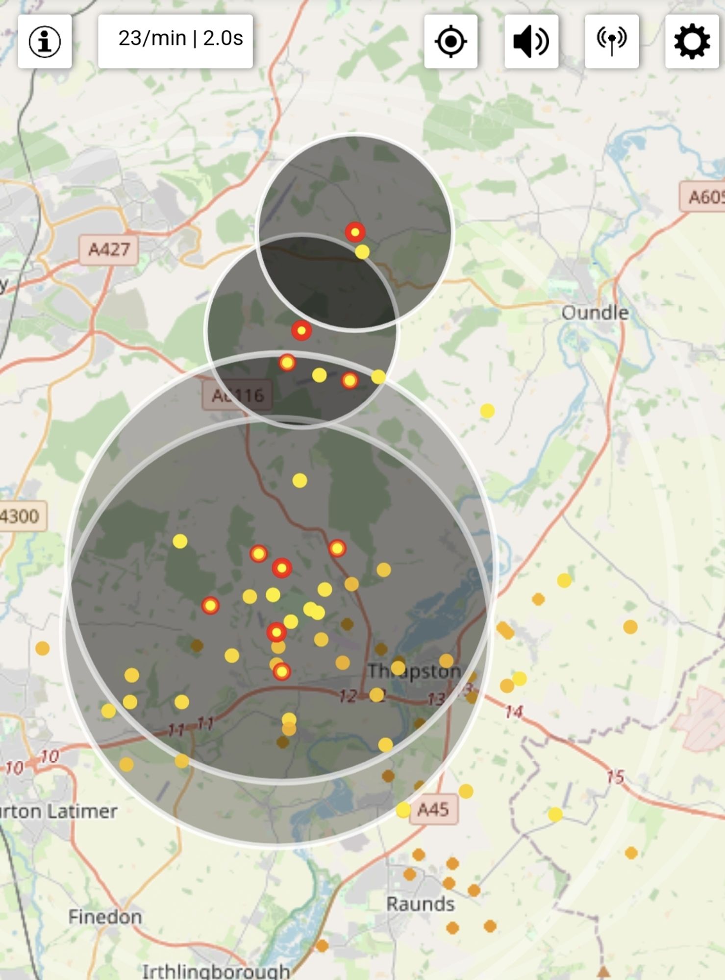 Screenshot from https://www.lightningmaps.org/ showing four expanding sound waves from strikes in quick succession, with many other dots showing strikes from the minutes before.