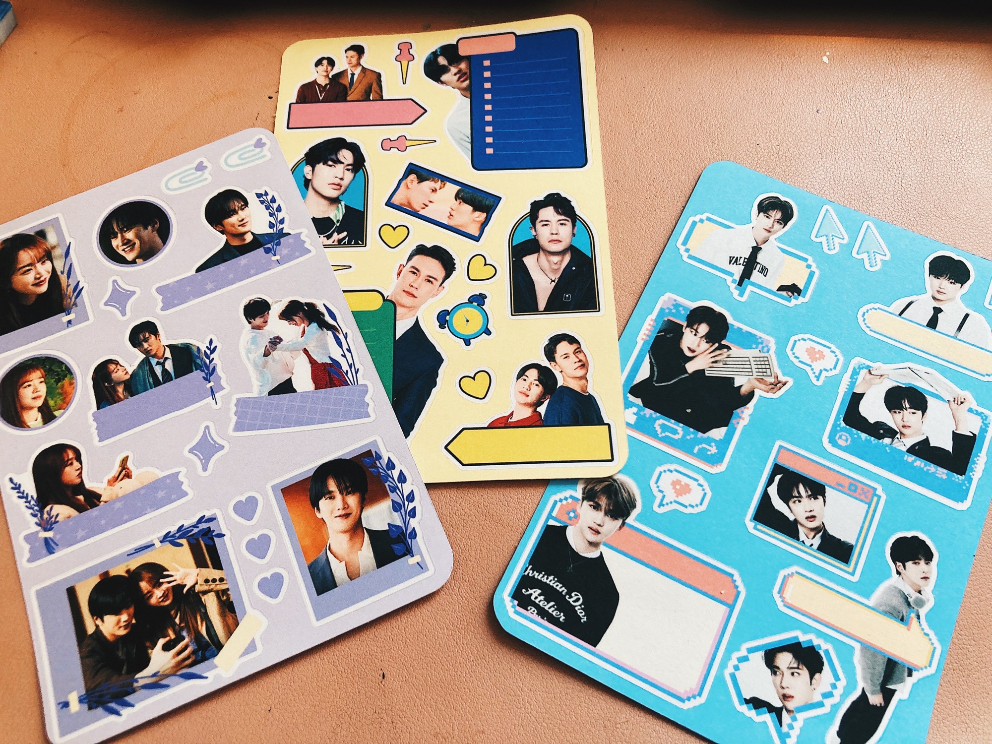 A set of 3 sticker sheets for agenda planning. One is purple and features the main couple from the Korean drama See you in my 19th life. One is yellow and features the main couple from the Thai show Step by Step, and the last is blue and features the members of the new kpop boy group Lun8 