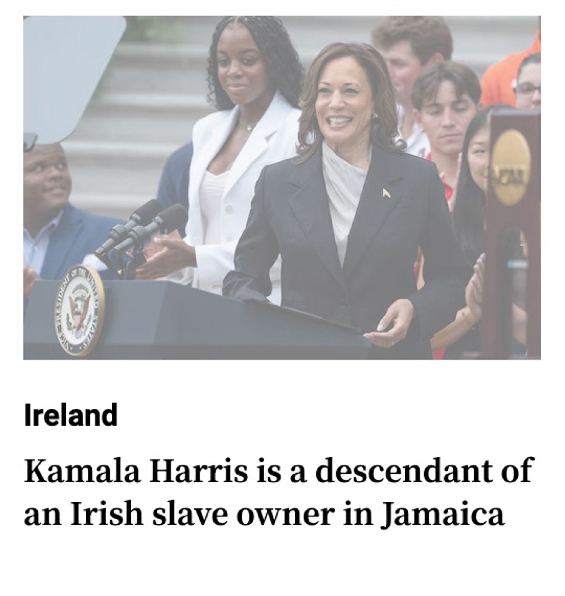 Irish Times headline - Kamala Harris is a descendant of an Irish slave owner in Jamaica
Image of Kamala Harris at a presidential podium