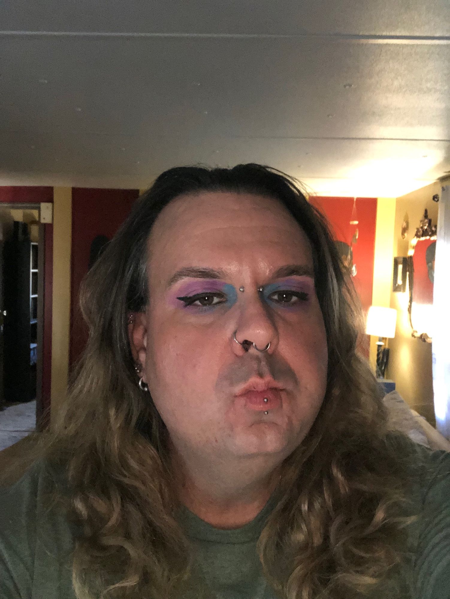 Me, eyes shadowed, lips puckered, on my way to a drag show.