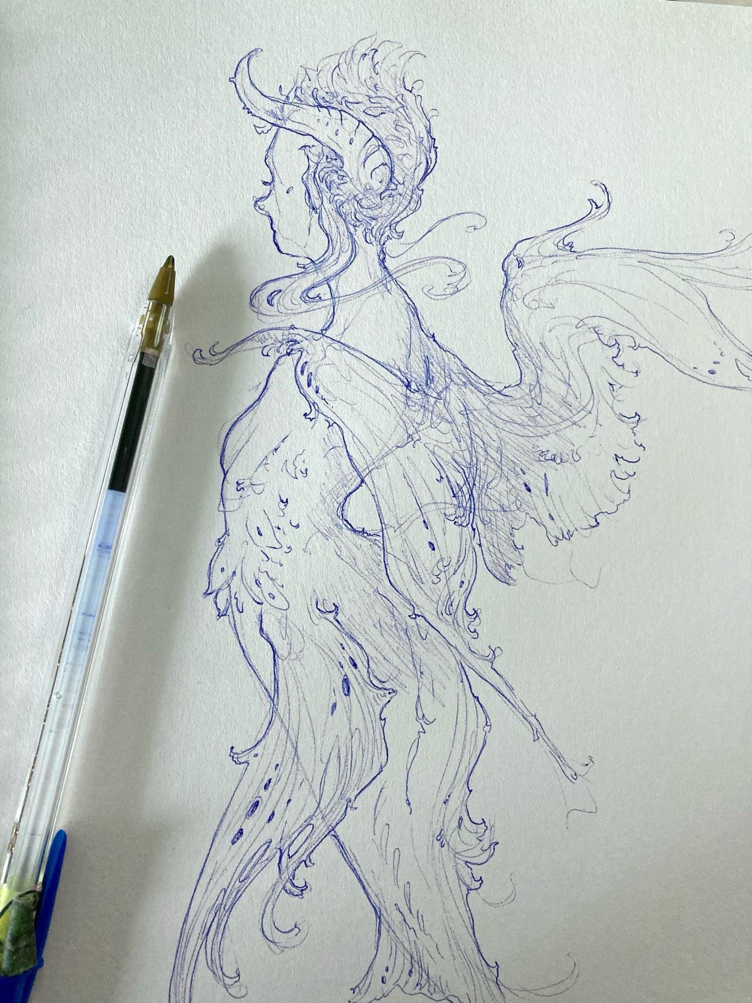 Ballpoint sketchbook drawing of a mermaid with draconic features