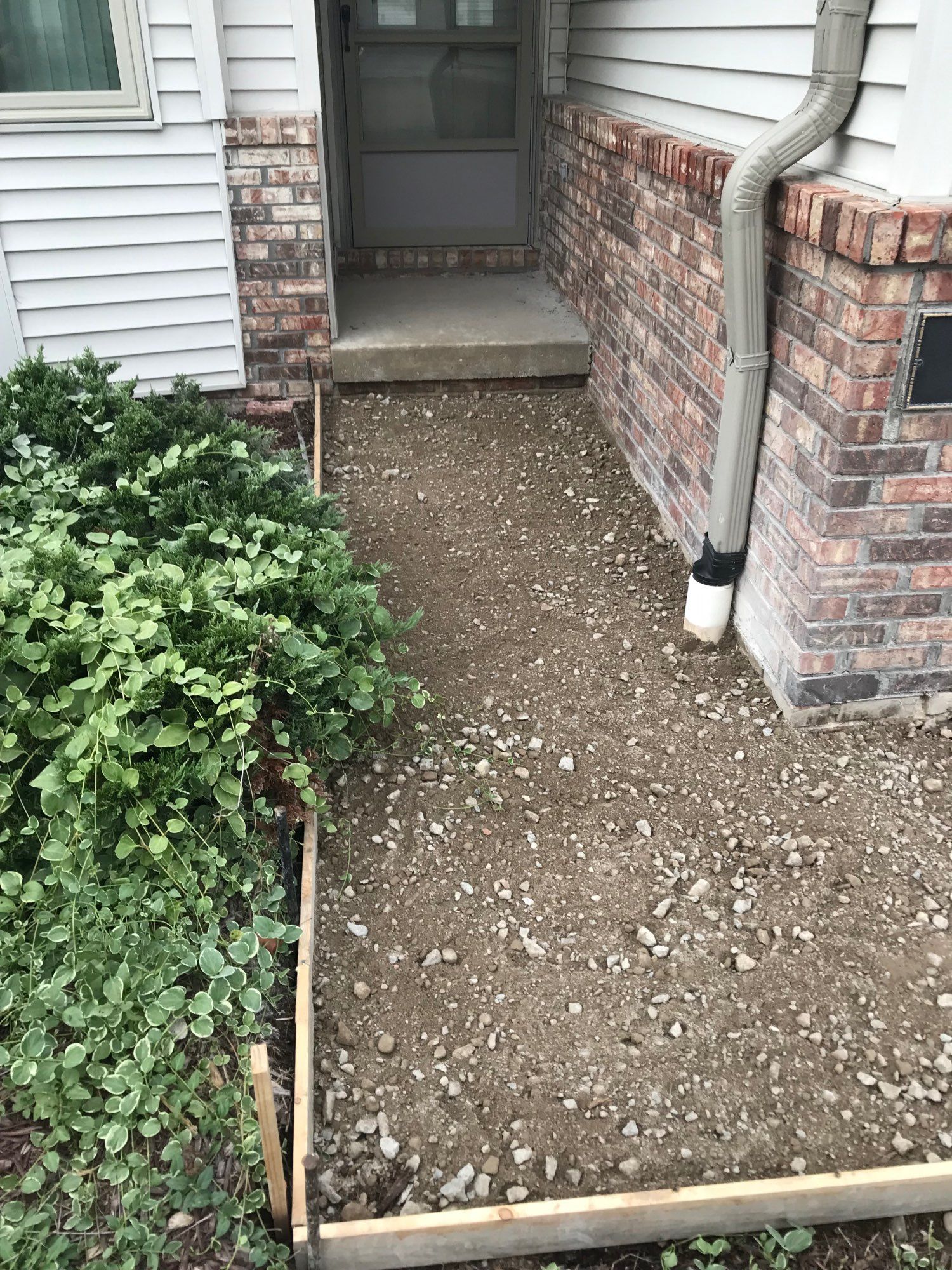 Front walkway framed but not tamped and pre-rebar