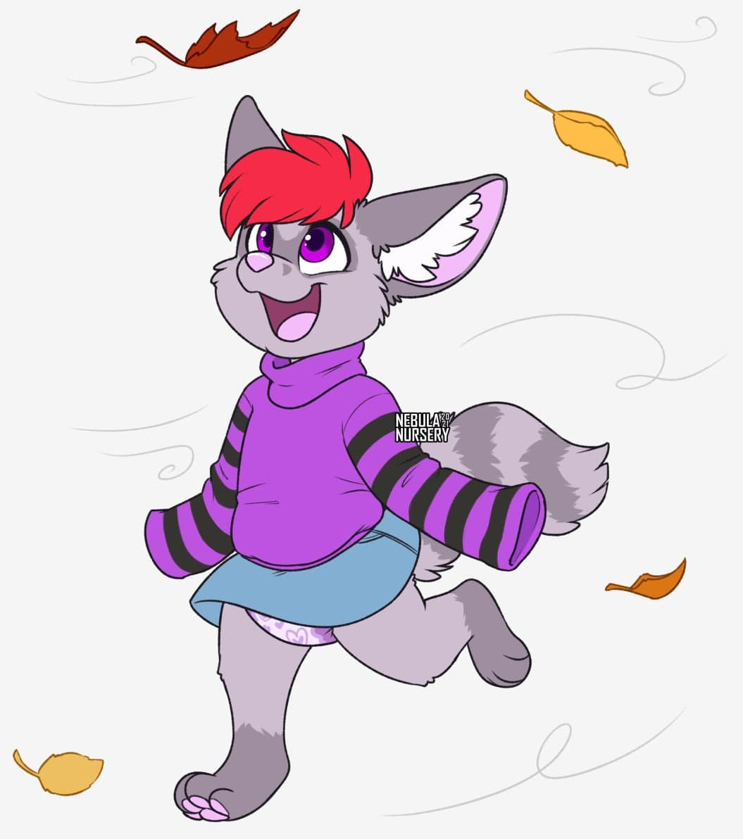 Galen in an oversized purple sweater with black stripes on the sleeves, over blue skirtalls, where only the skirt is visible. There's a slight bit of diaper peeking under the skirt, and a huge smile on their face. Leaves blow around in the background.