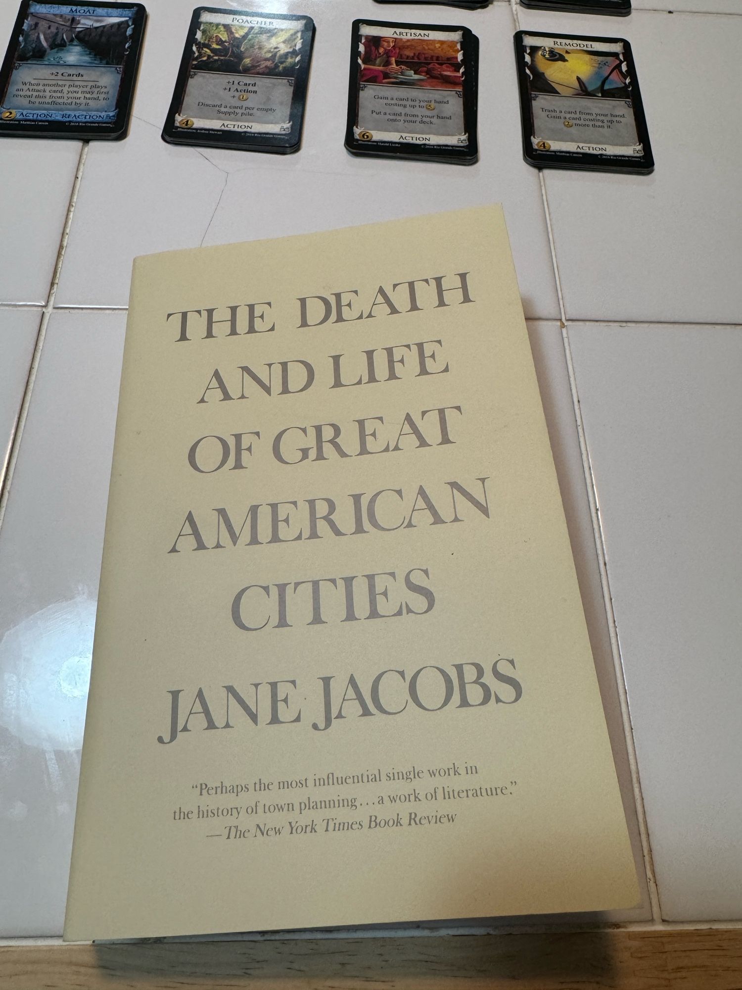 Nothing exciting to see here just a picture of the cover of the Jane Jacobs book, "the death and life of great American cities."

In the background is the set up of the game of Dominion I'm about to play with Griffin.