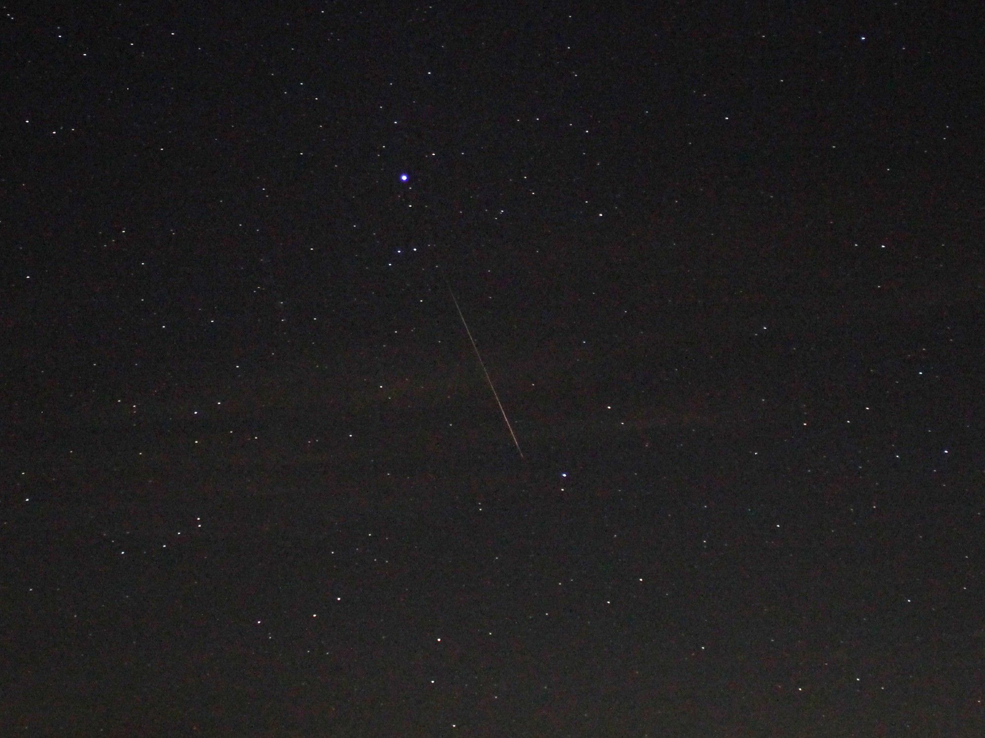 A Perseid meteor in Aquarius just below Saturn.