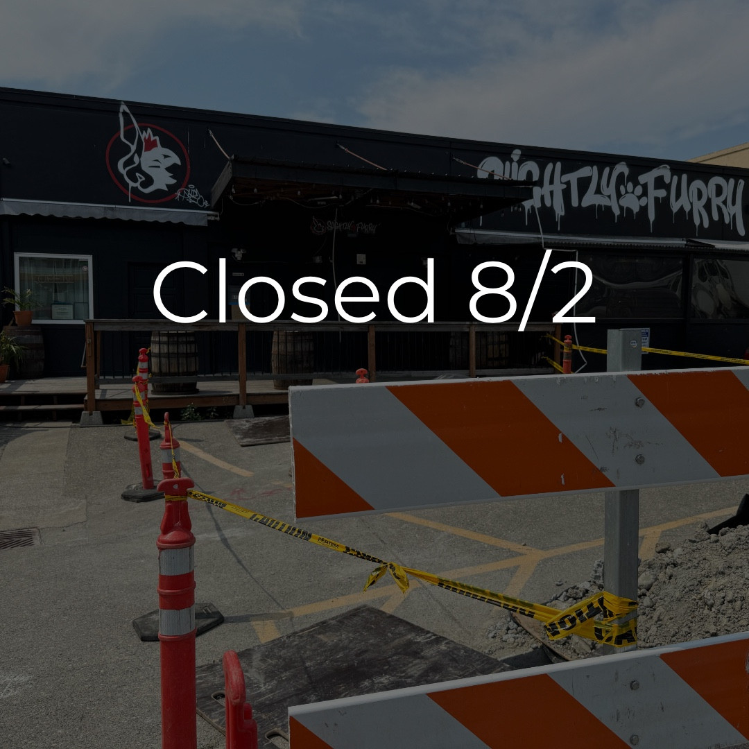 Text that says Closed August 2nd in front of the Slightly Furry building with construction cones in front