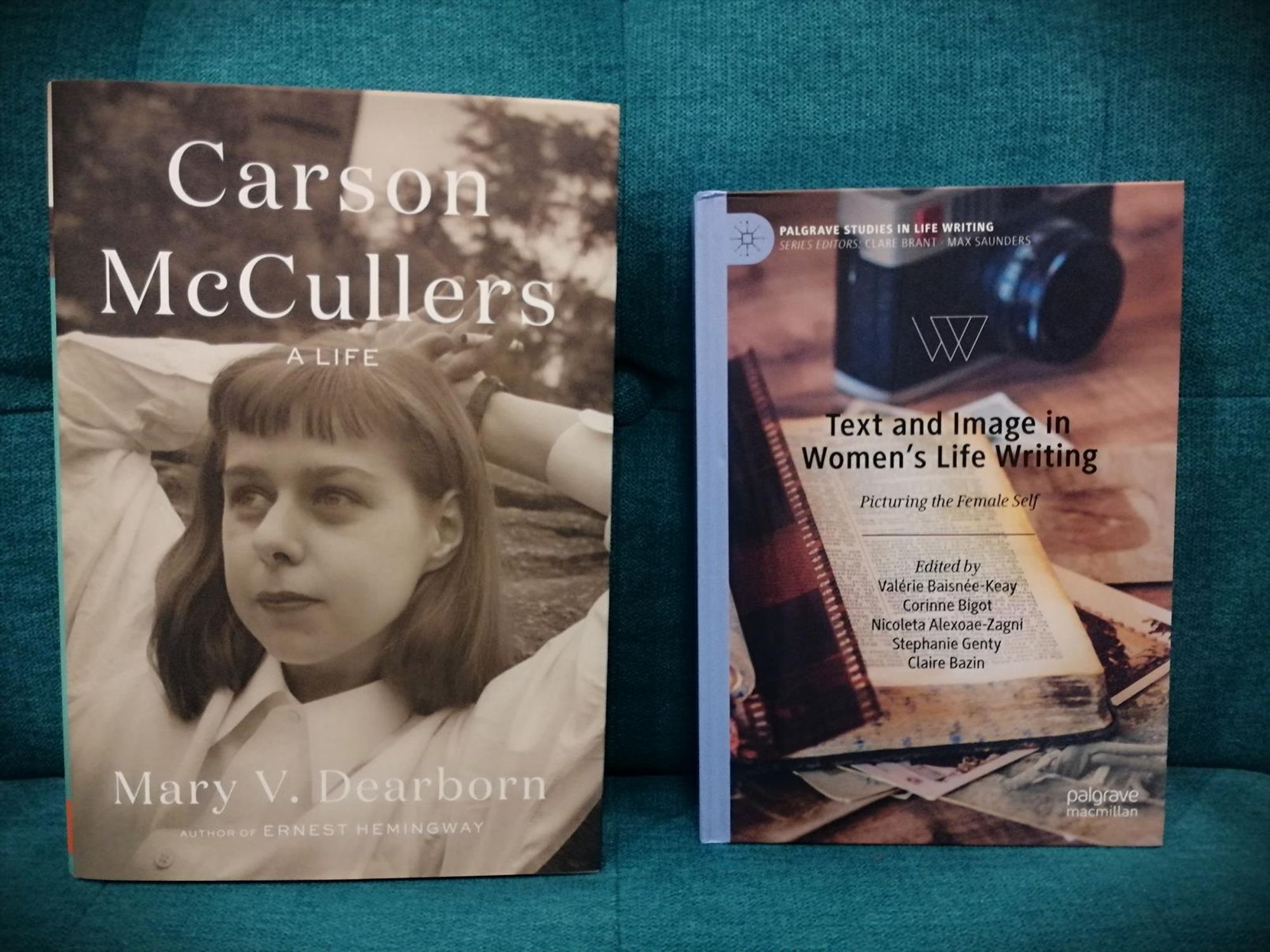 Dearborn's Carson McCullers biography & "Text and Image in Women's Life Writing" on a teal-coloured chair