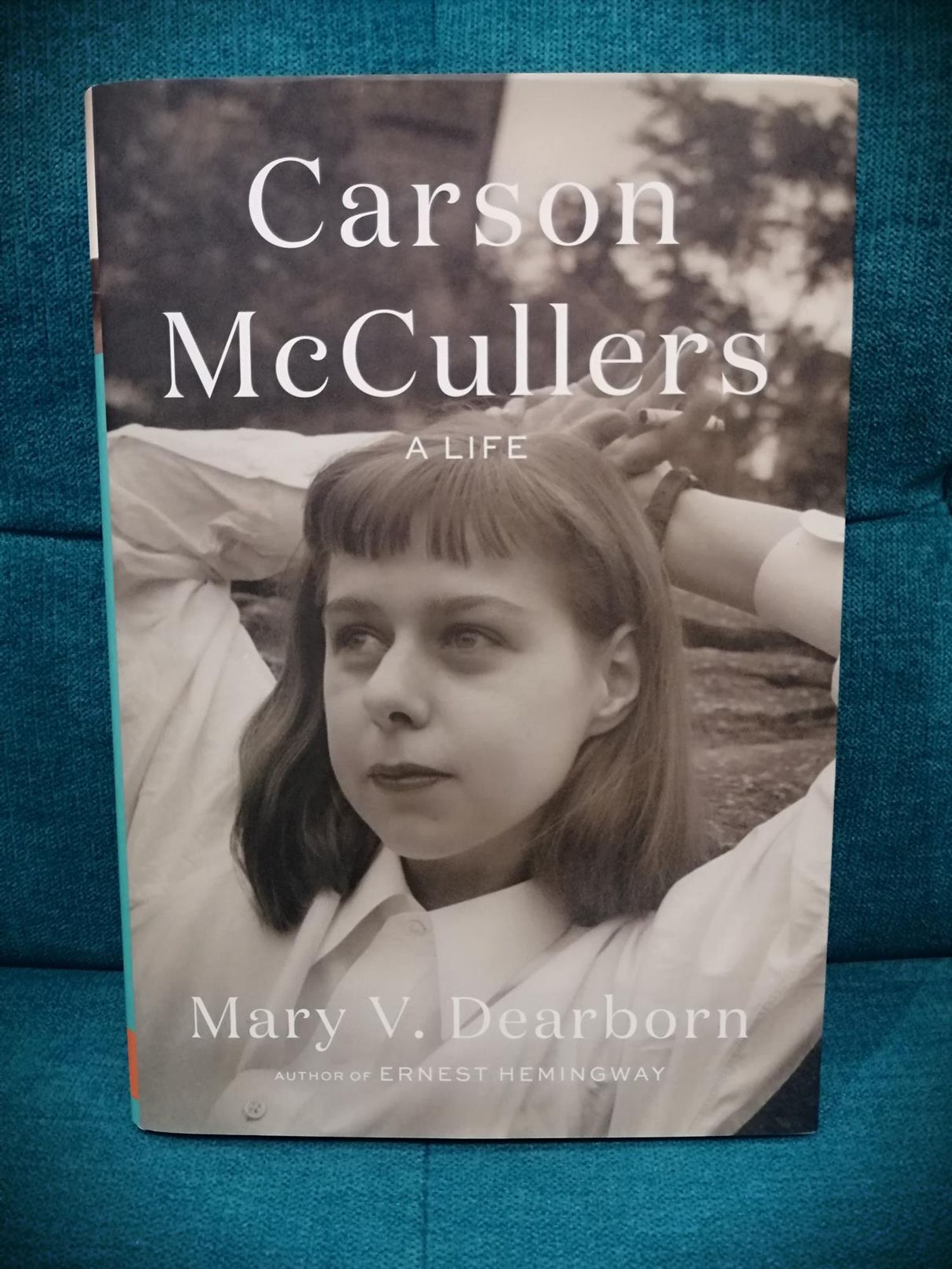 Dearborn's Carson McCullers biography on a teal-coloured chair