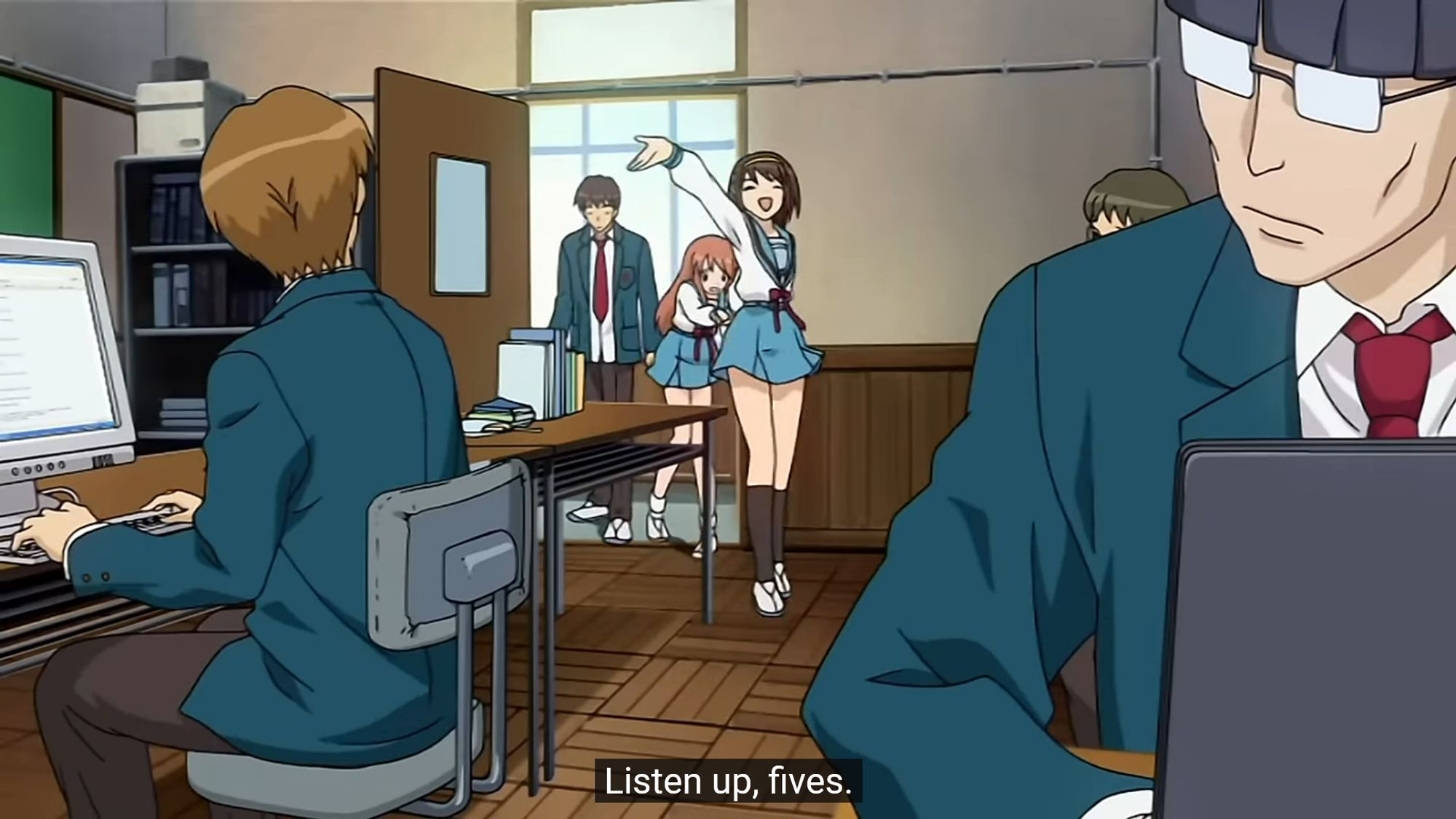 A shot of Melancholy of Haruhi, Haruhi walks in to the computer club
"Listen up, fives."