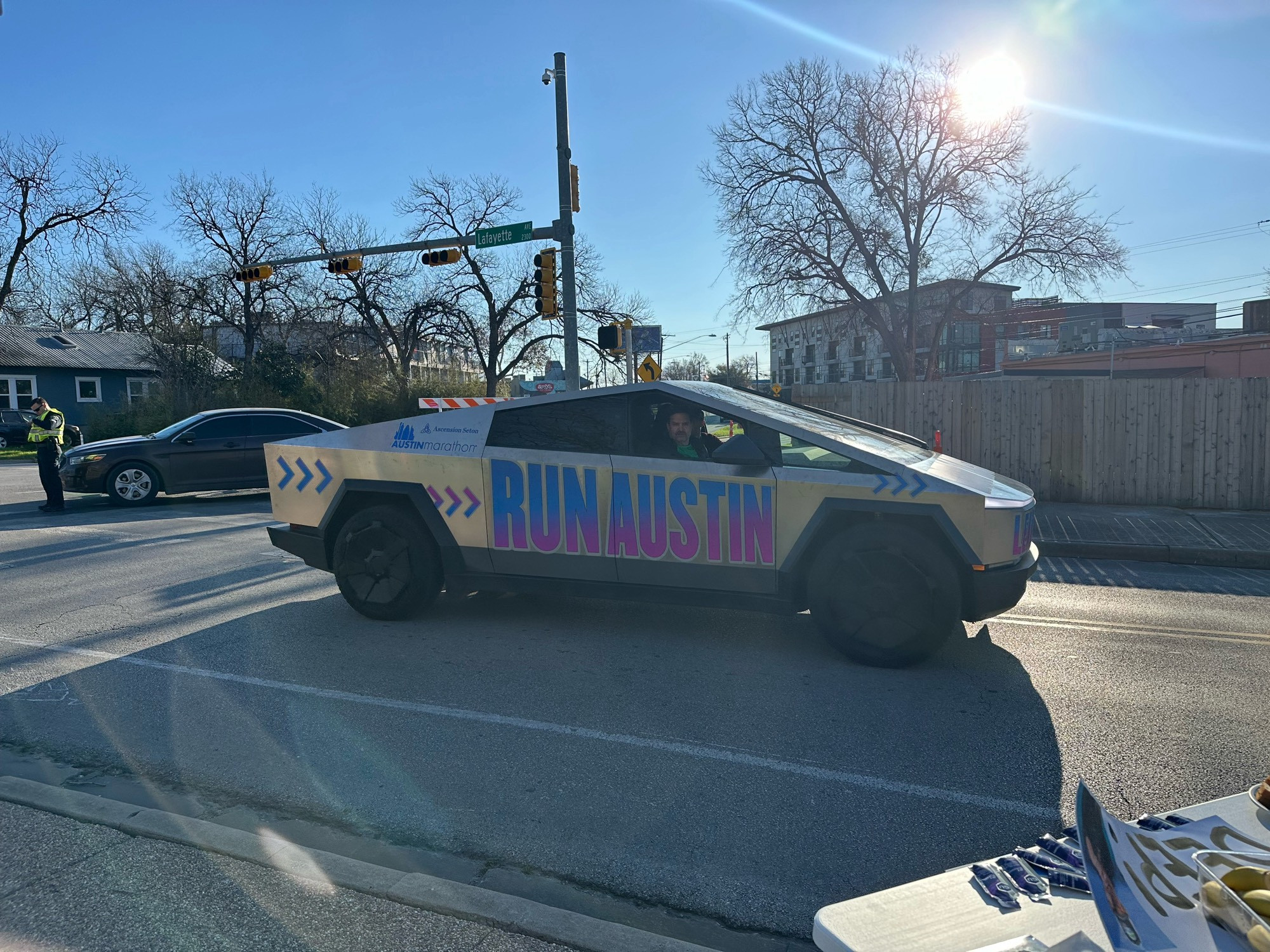 Tesla cyber truck outfitted with decals that say “RUN AUSTIN”