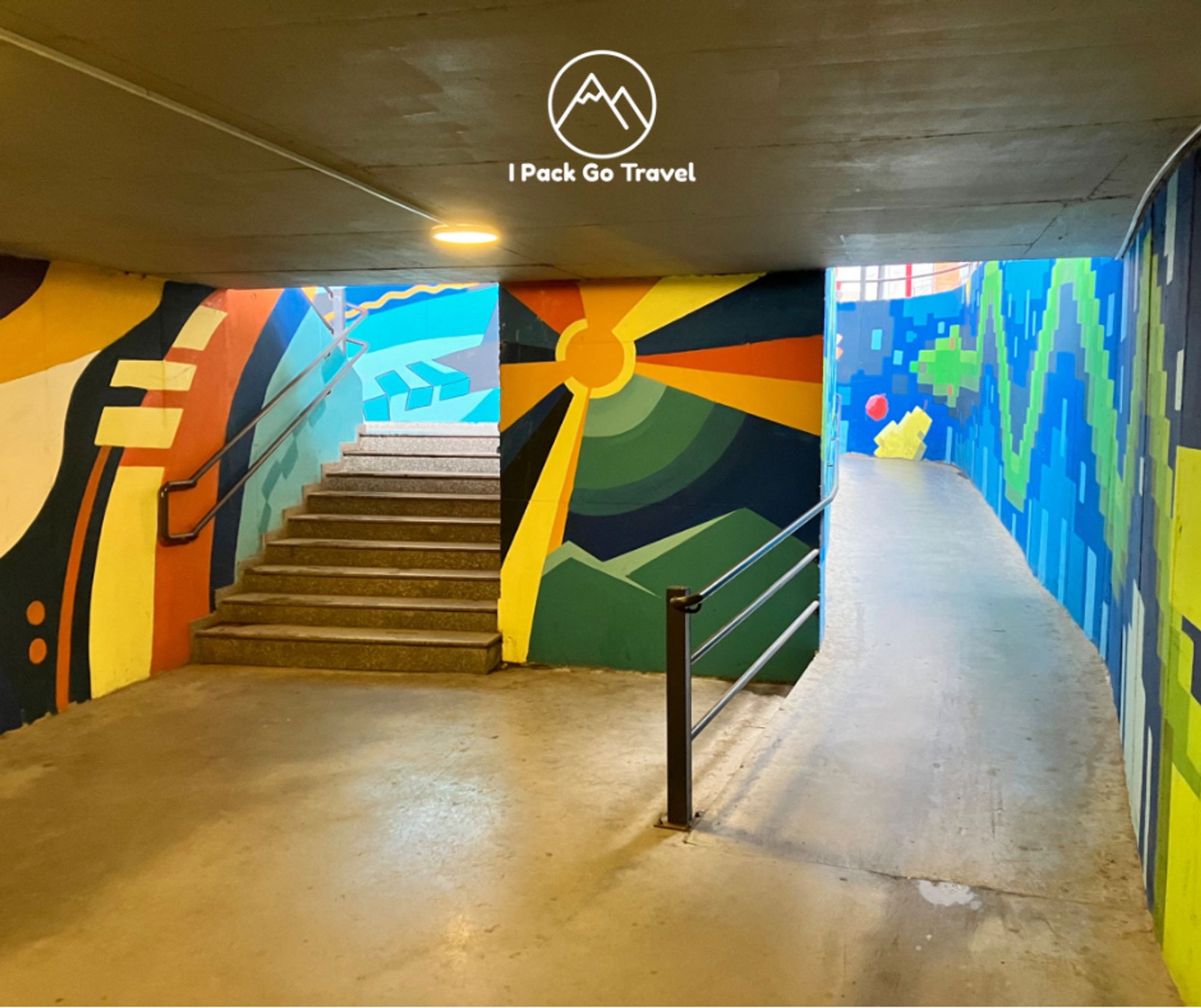 An underground subway painted in bright and cheerful colours.