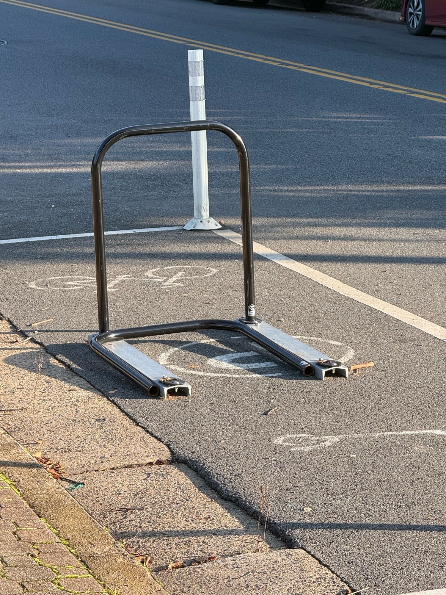 A mowed down bike rack on MVA near Los Tios.