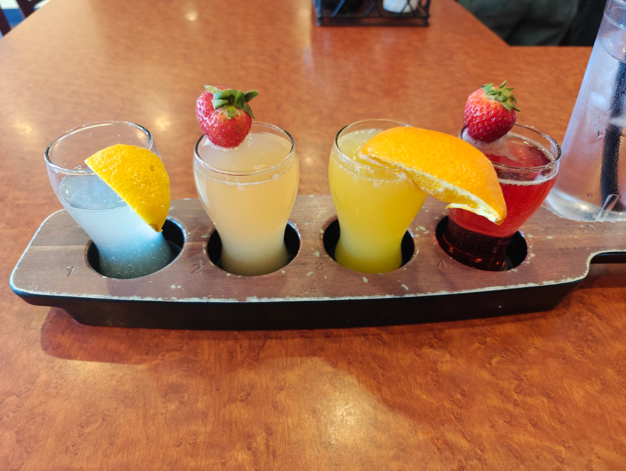 A flight of Mimosa

Lemonade, strawberry, orange, and pomegranate