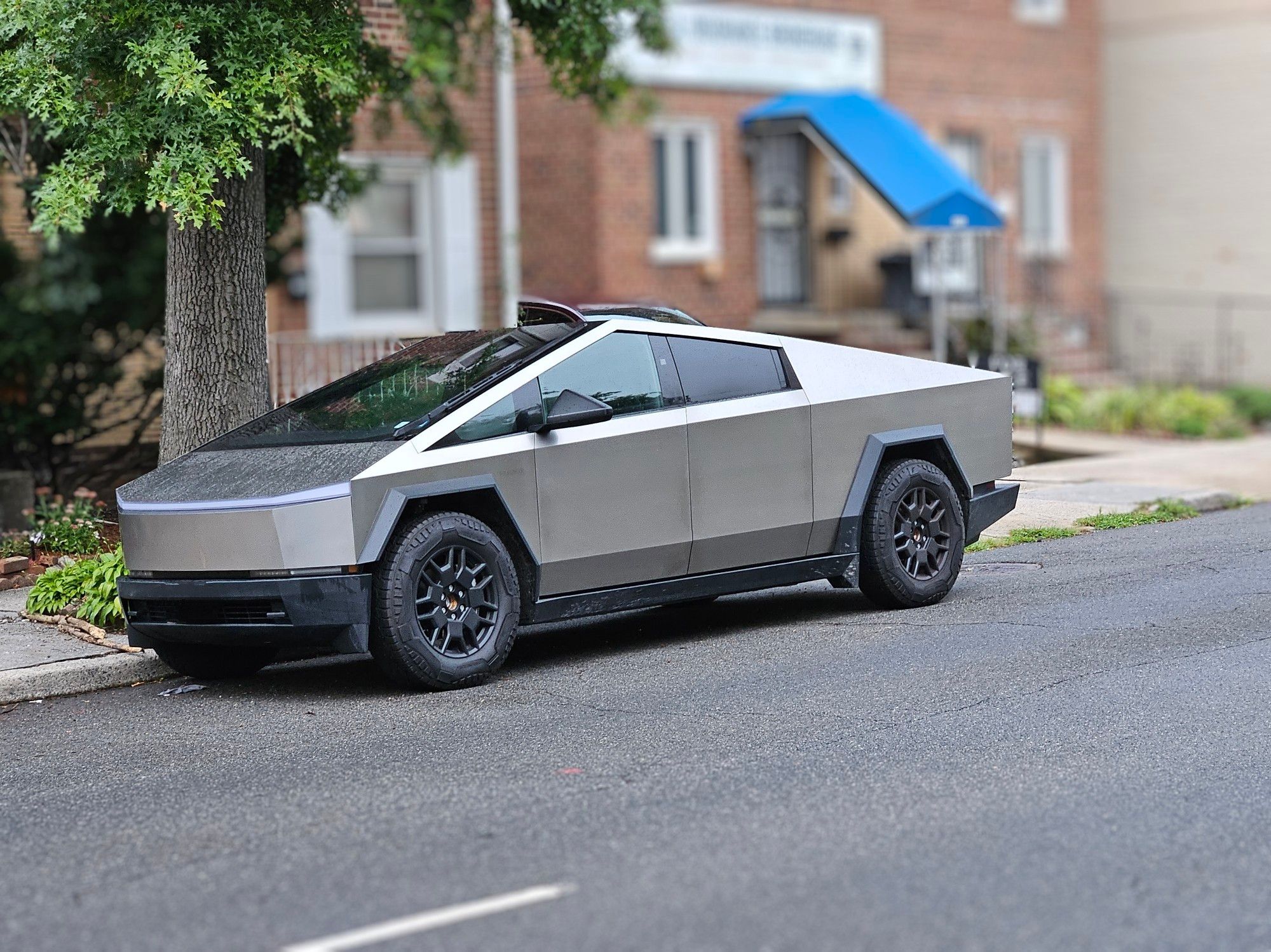 A Cybertruck parked on the street.