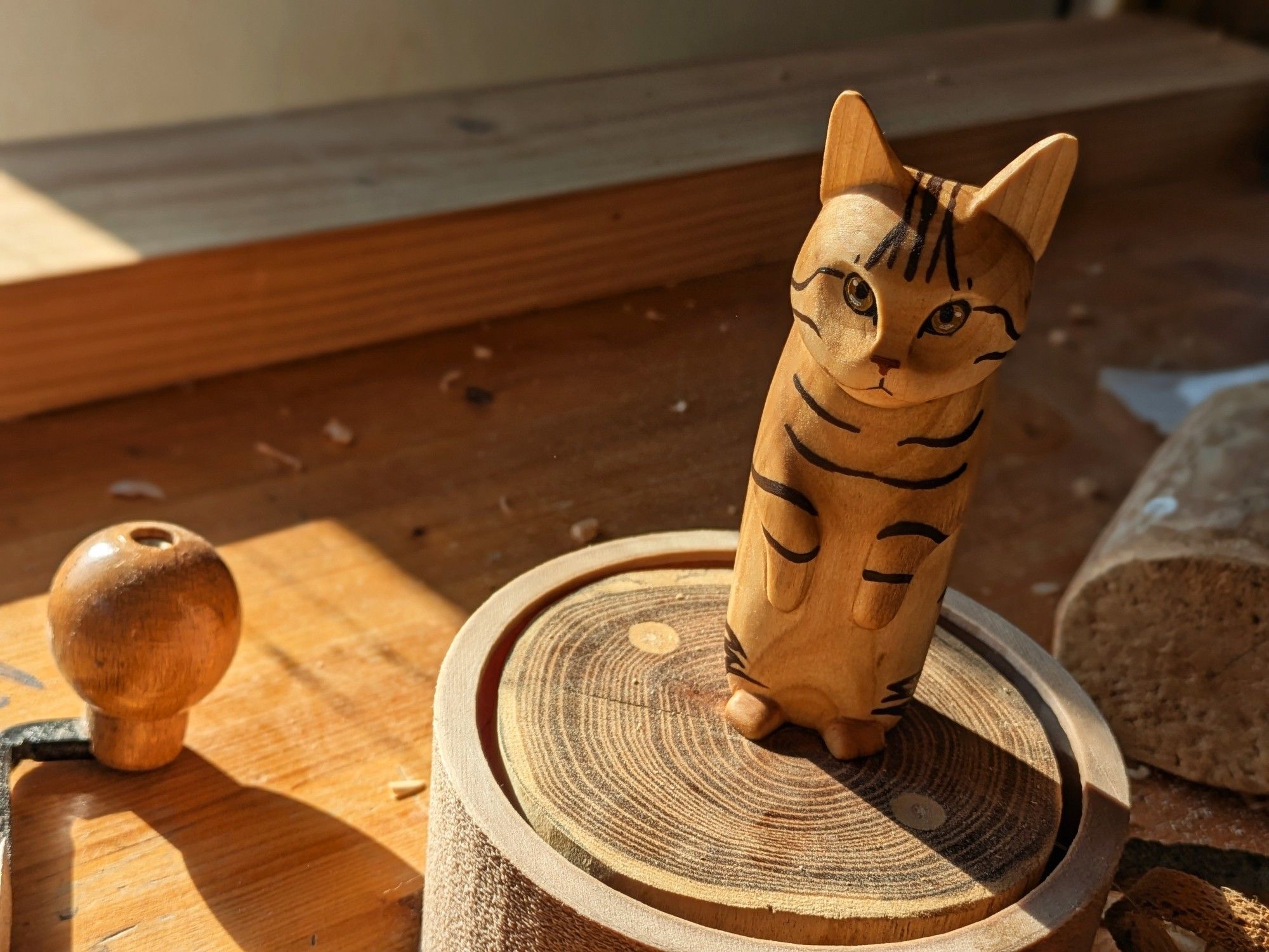 Woodcarver standing cat