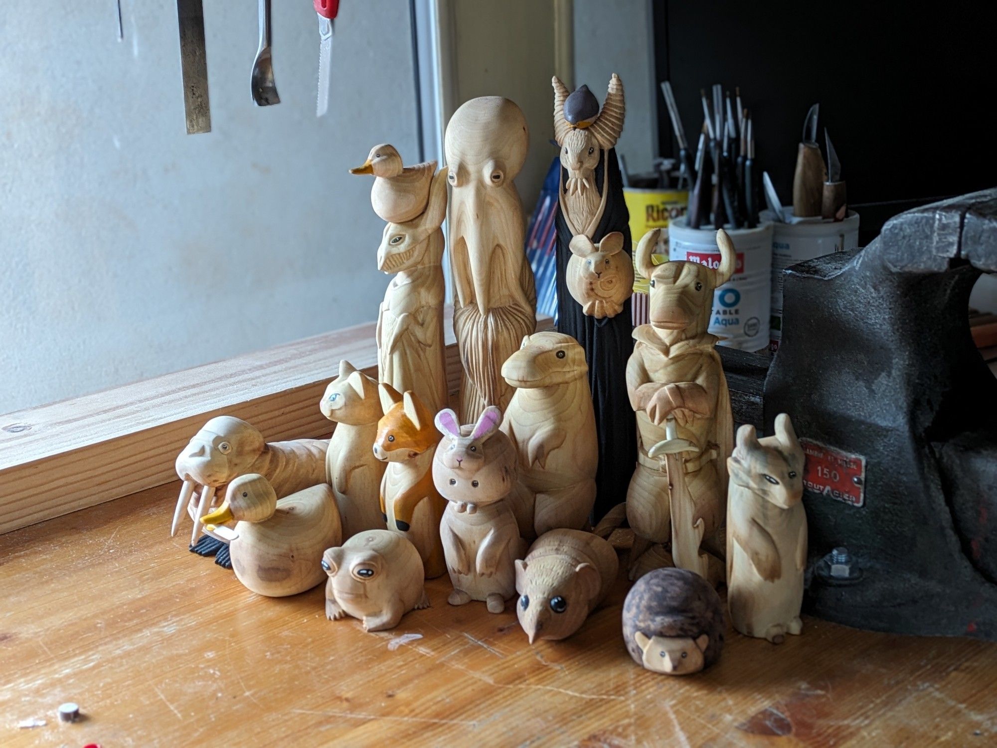 Assembly of woodcarved animals and monsters