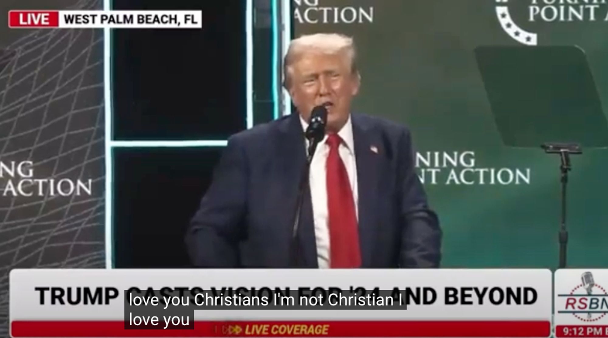 Still frame from the video where Trump promises to become a dictator.

Closed caption reads: "love you Christians, I'm not a Christian, I love you."