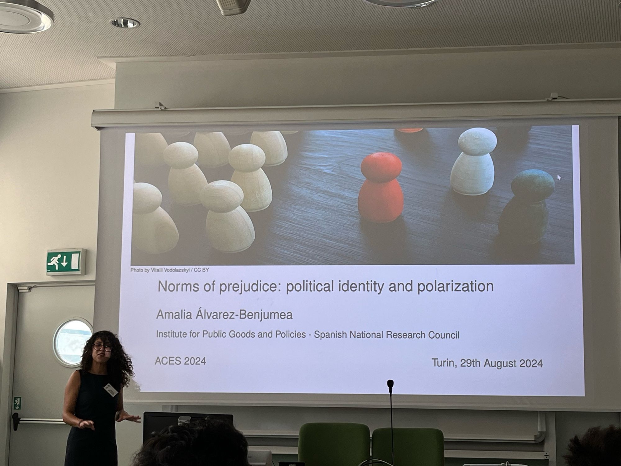 Amalia Alvarez Benjumea presenting “Norms of Prejudice: Political Identity and Polarization” at ACES 224