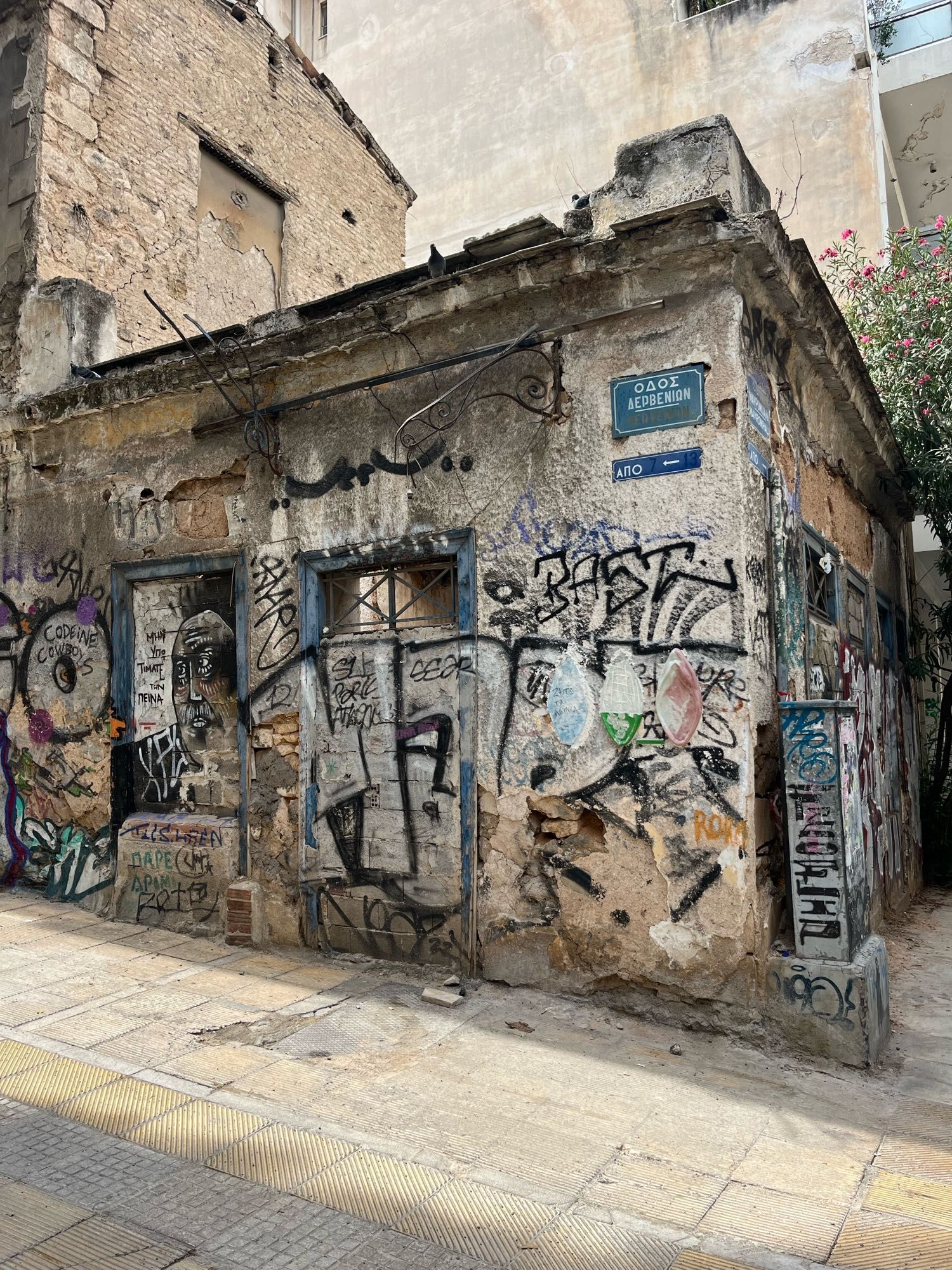 This one storey structure, covered with graffiti and with windows and doors blocked up, was once probably a shop