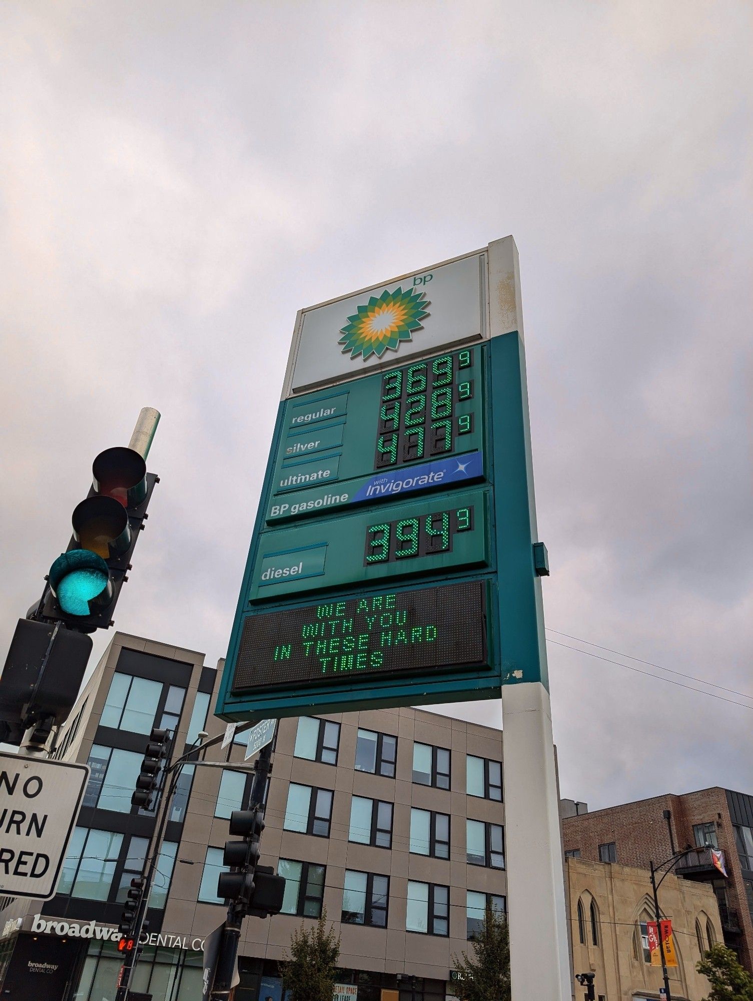 BP gas electronic sign that says "we are with you in these hard times"