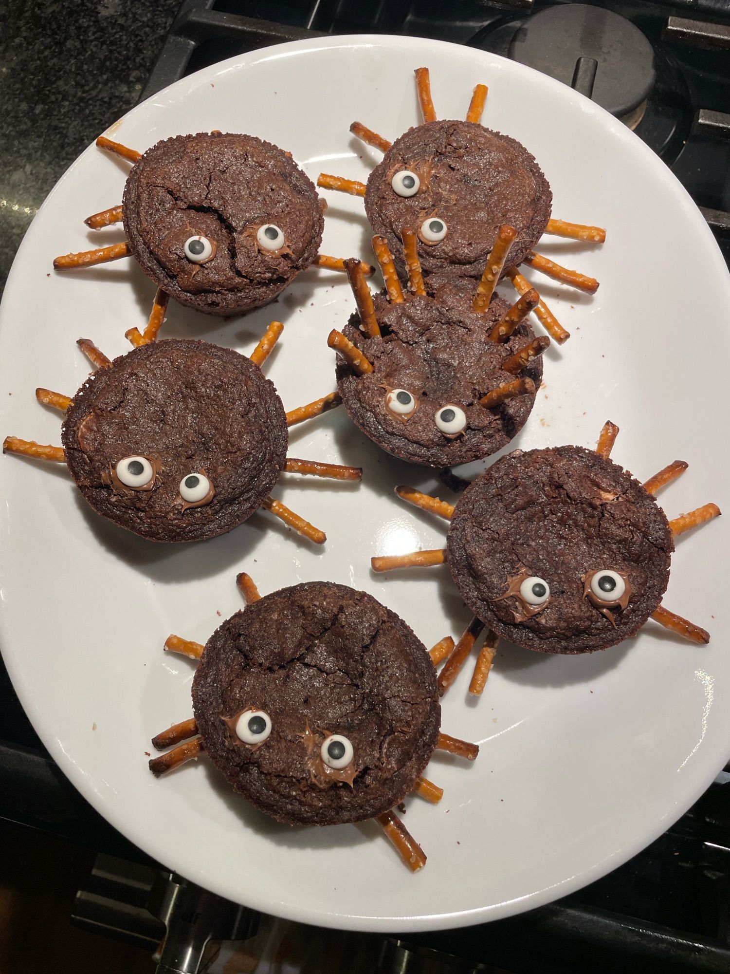 “Spiders” (brownies with candy eyes and pretzel legs)