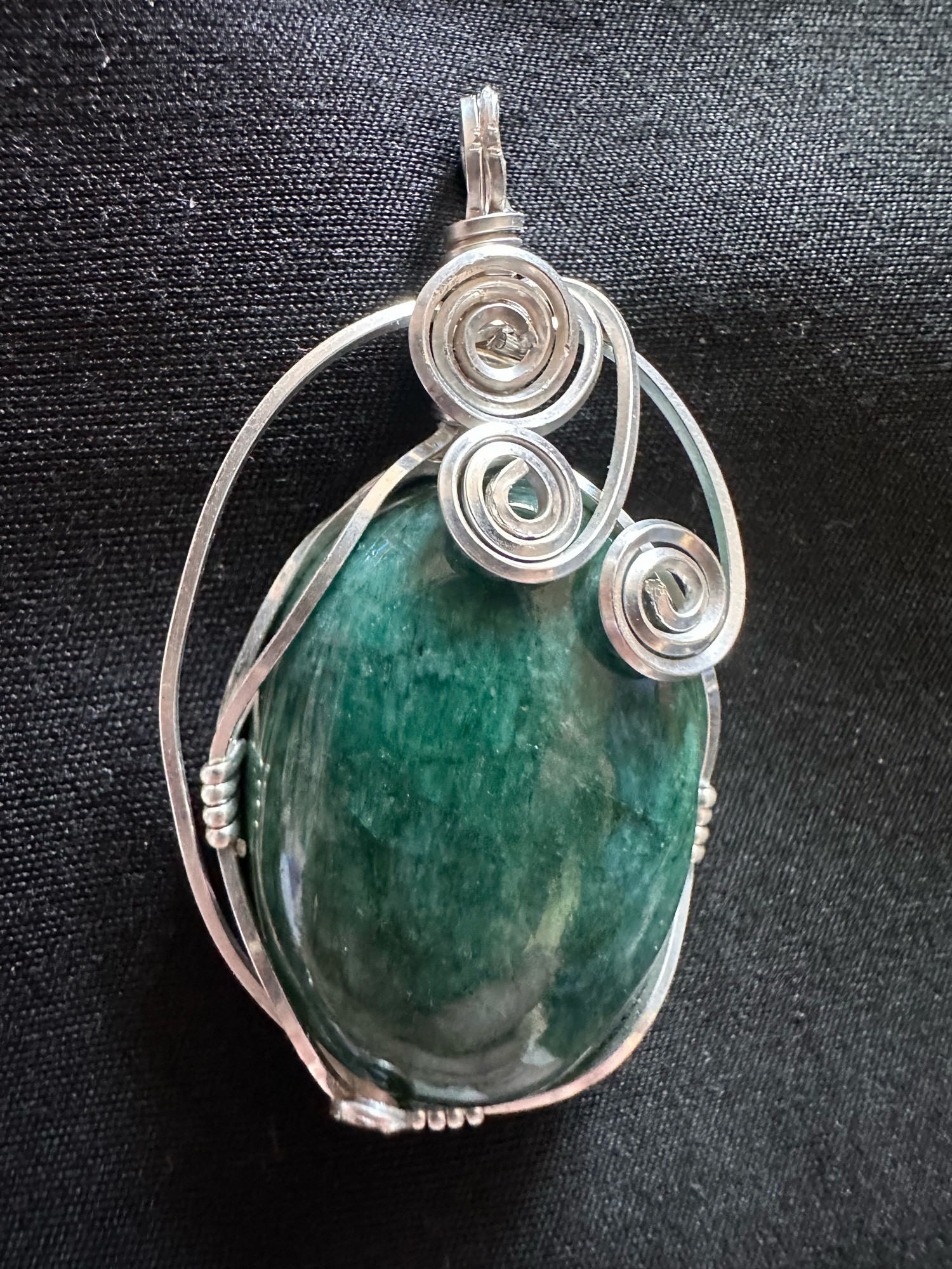 Photo of a wire wrapped emerald