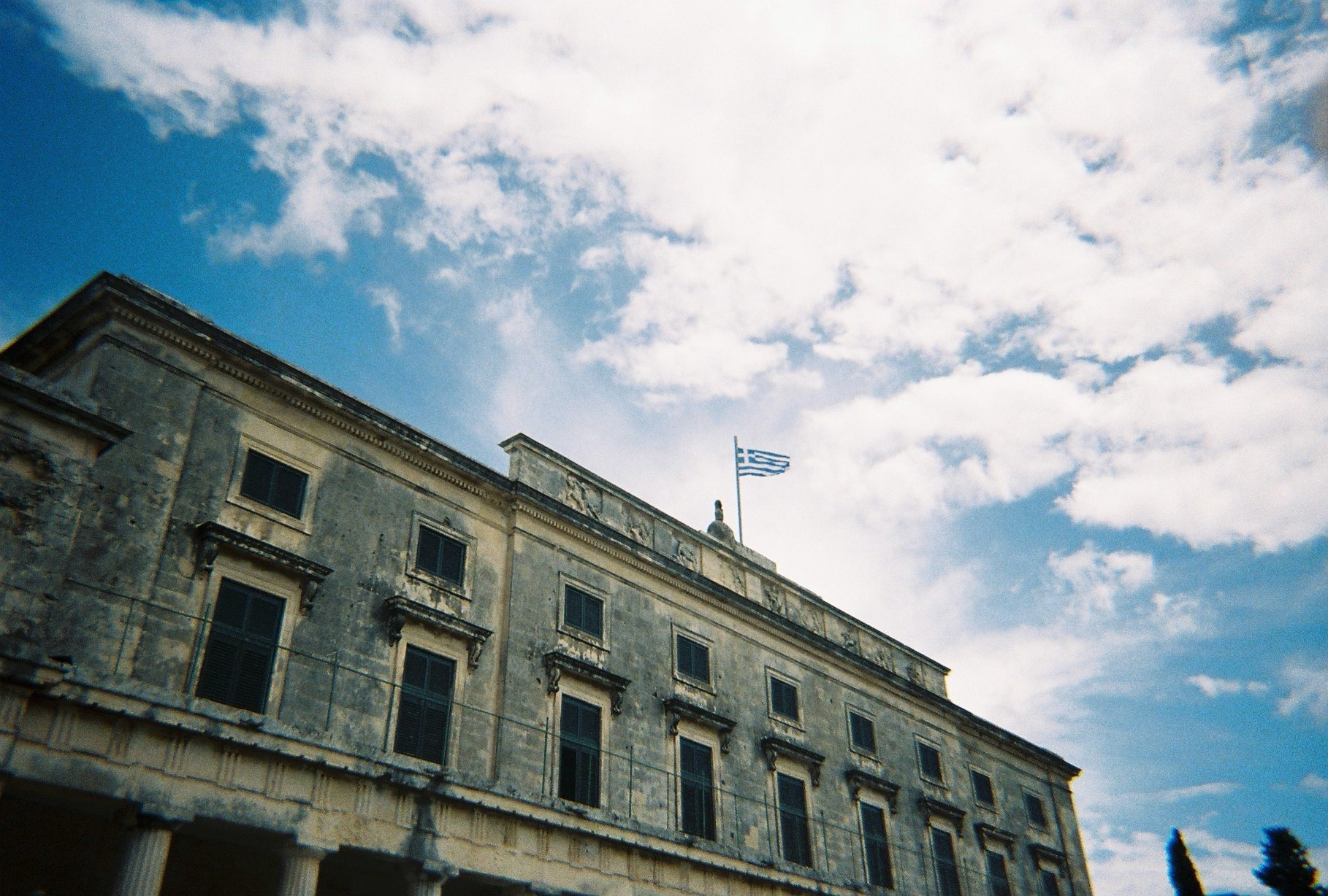 Building with the Greek flag on top