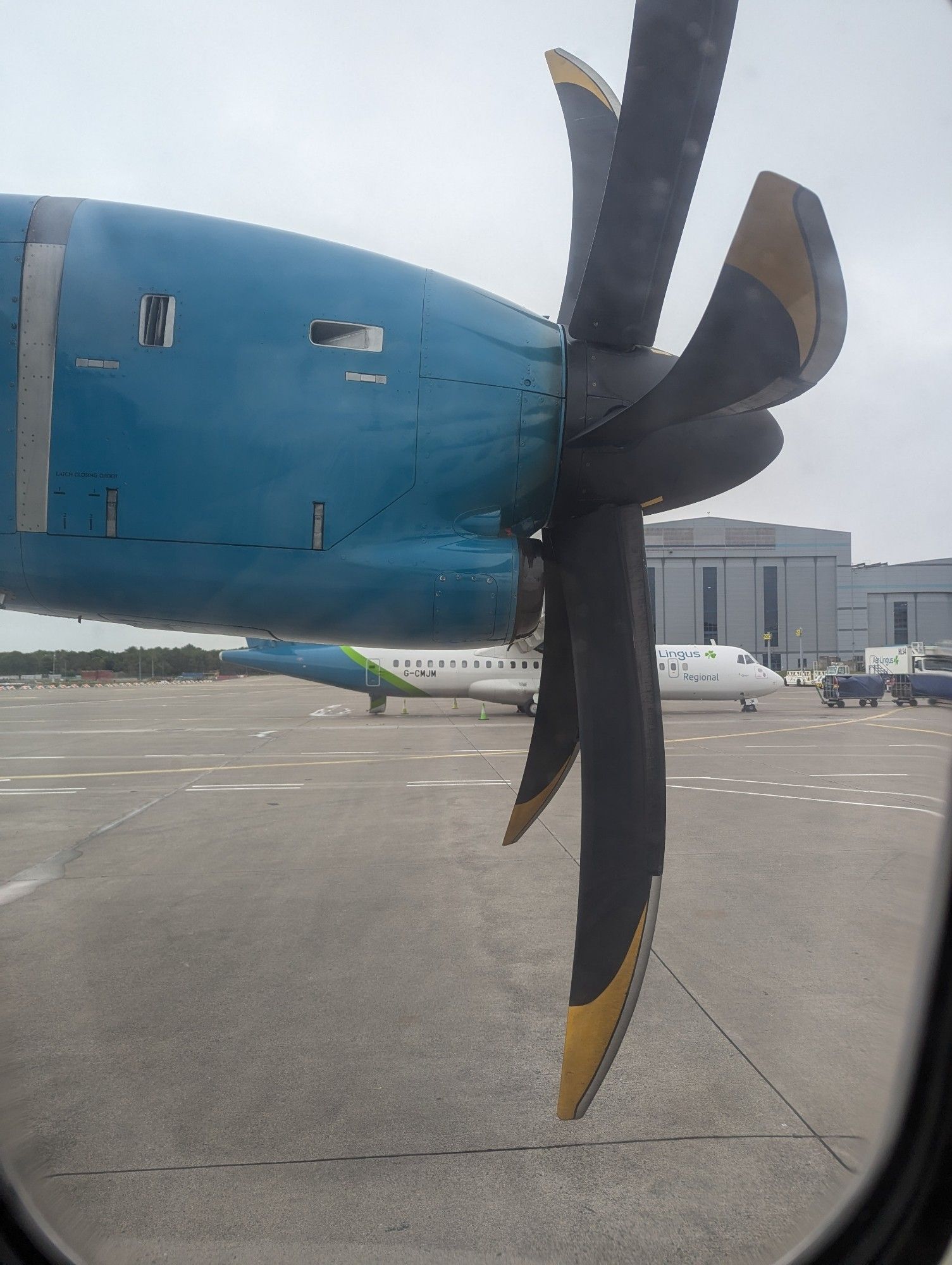 A turboprop engine viewed from a plane window