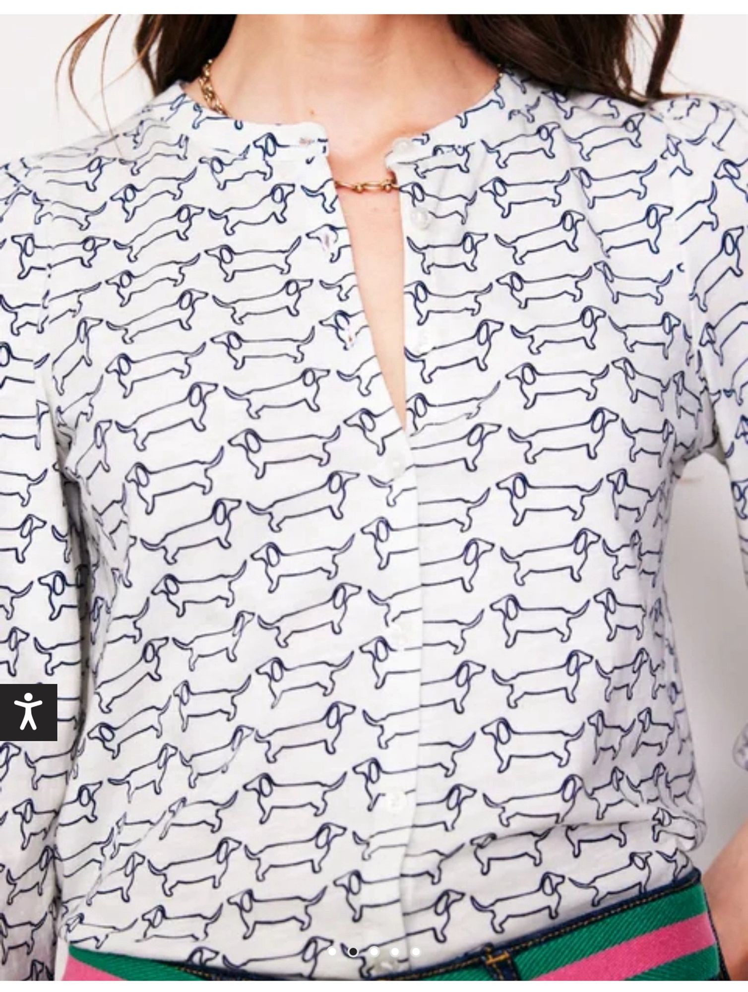 White woman’s button down shirt covered in dachshund print