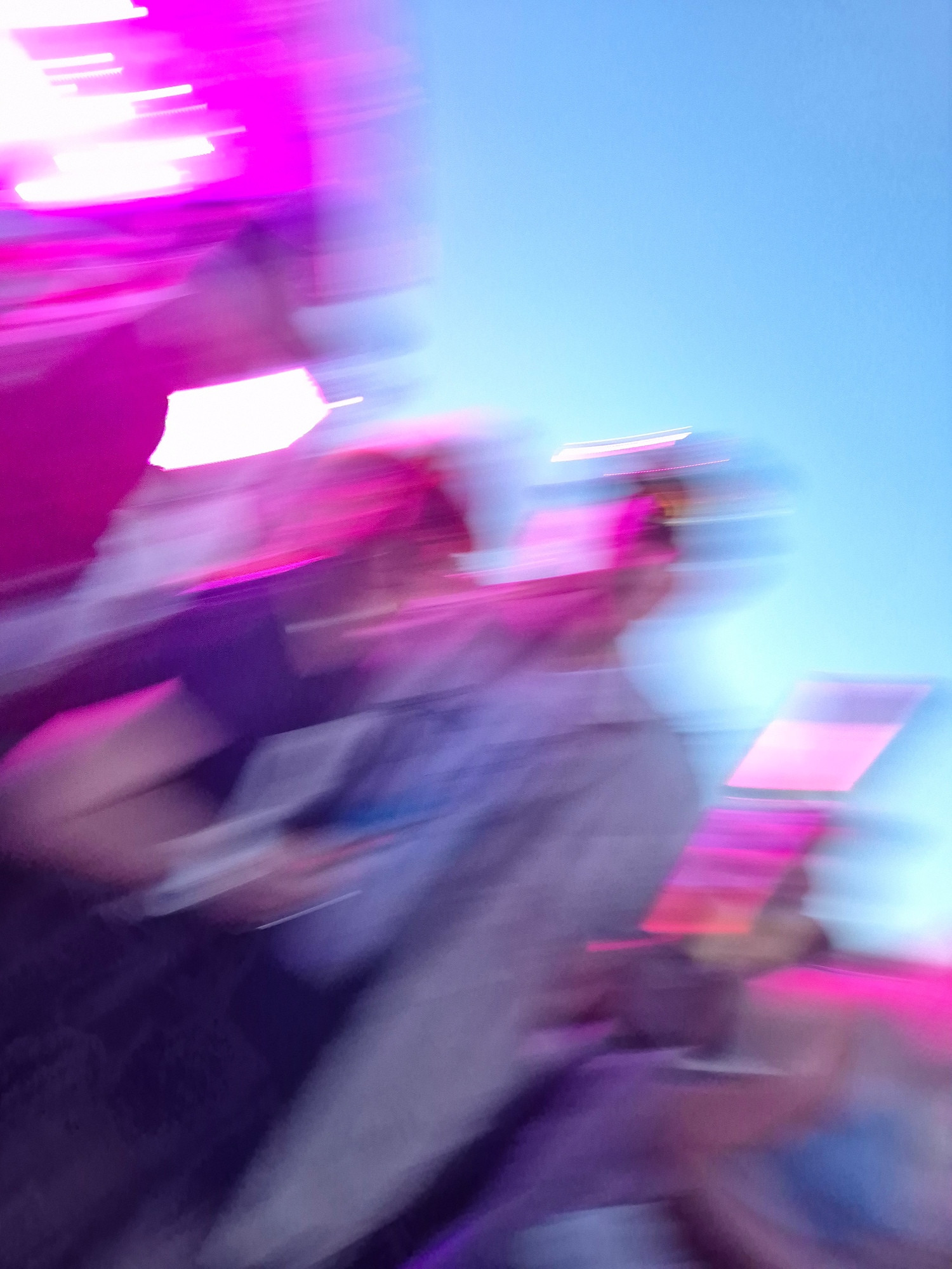 Very blurred picture of two people. Taken with very blurry vision. 