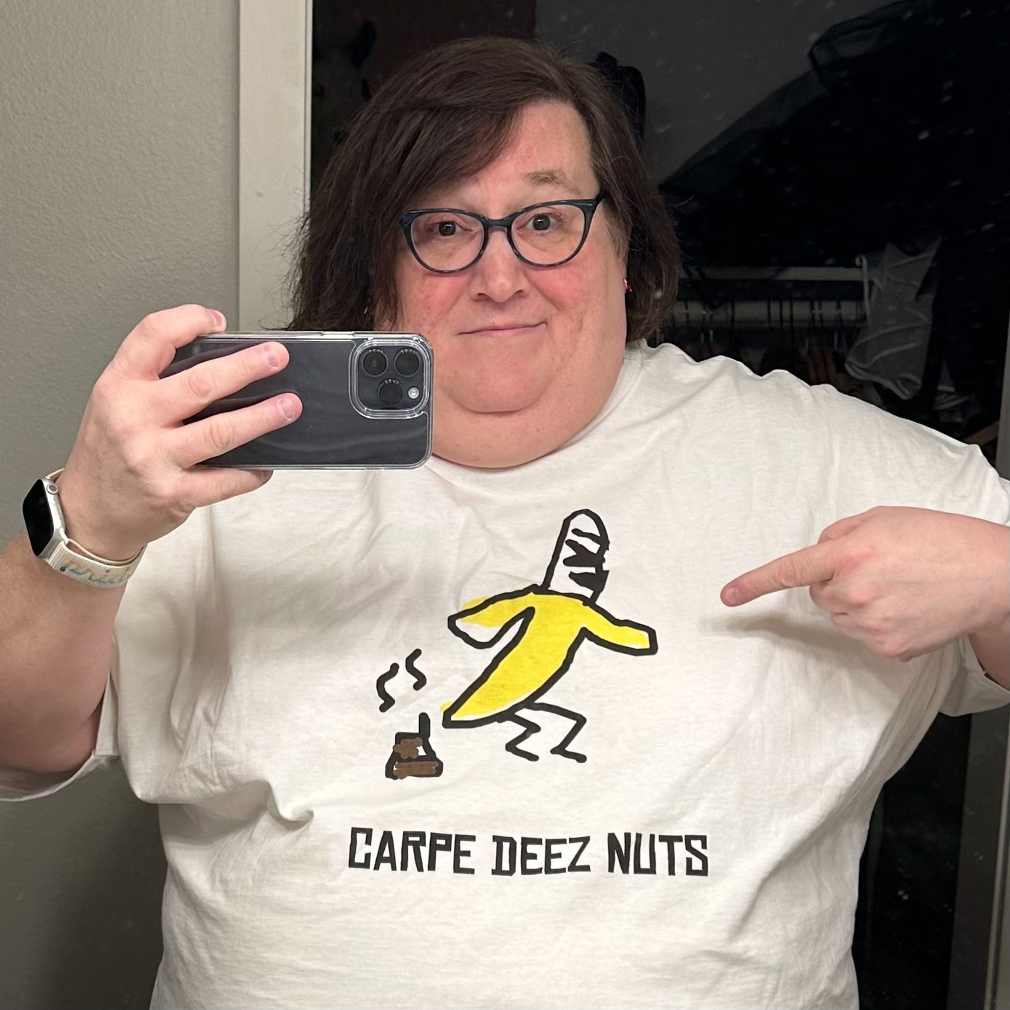 Jennifer Toledo wearing an actual t-shirt featuring a cartoon banana taking a crap and the caption "Carpe Deez Nuts."