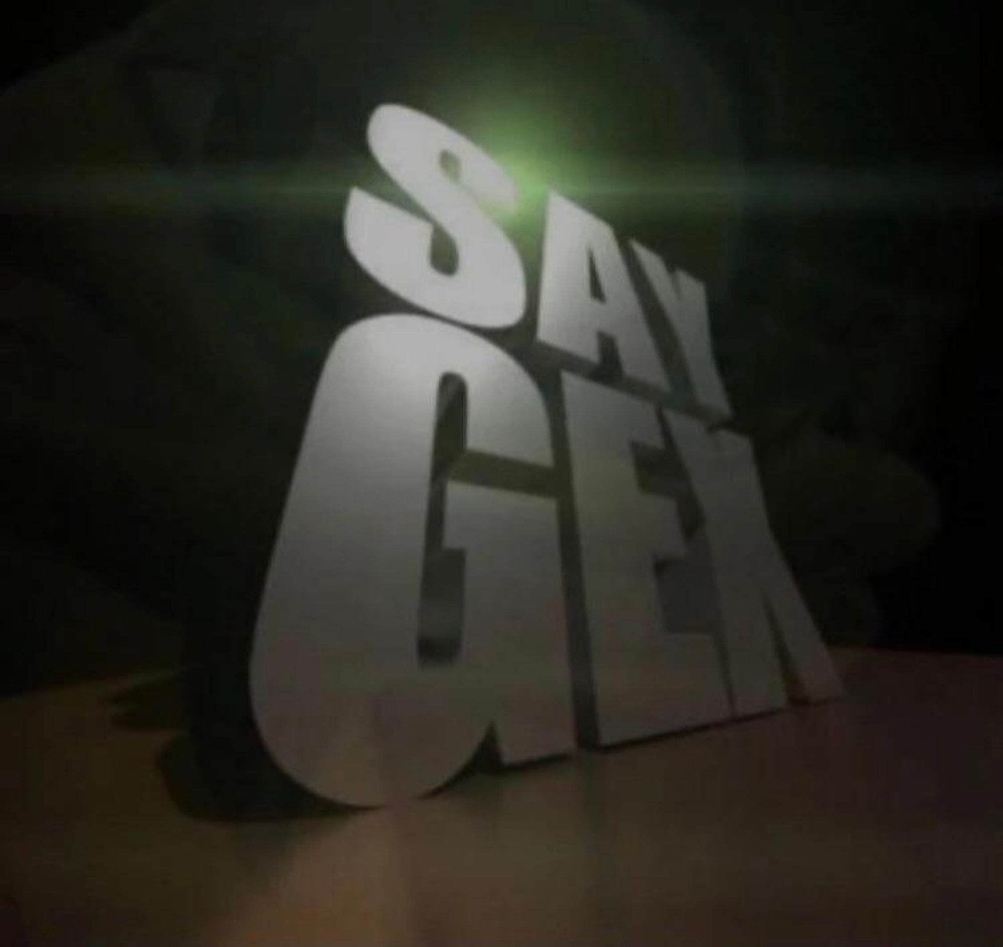 Huge letters forming the words "say gex"