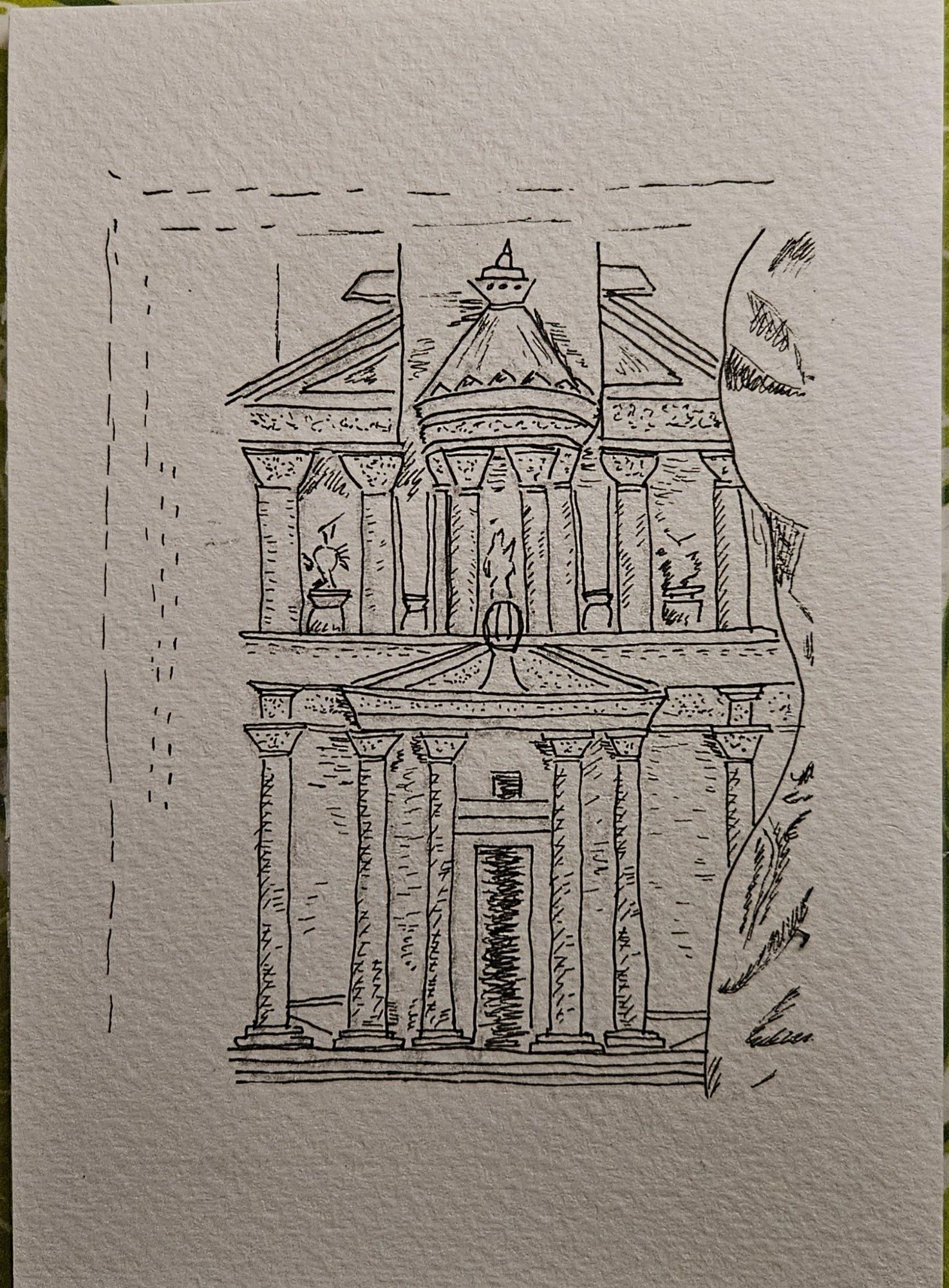 Hochformat. Blick von vorn auf das "Schatzhaus des Pharao" in Peta. Rechts wird es von einem Felsen flankiert. Auf dem Aquarellpapier ca A6 mit schwarzem Fineliner. Etwas Schraffur mit diesem Stift.