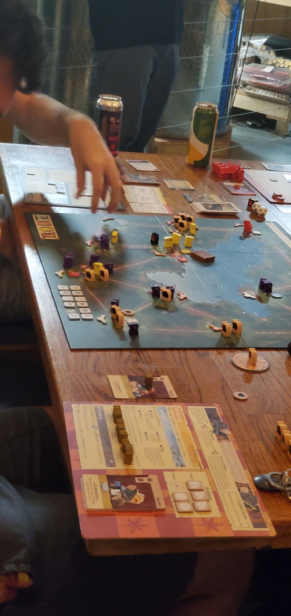 The board game root being played