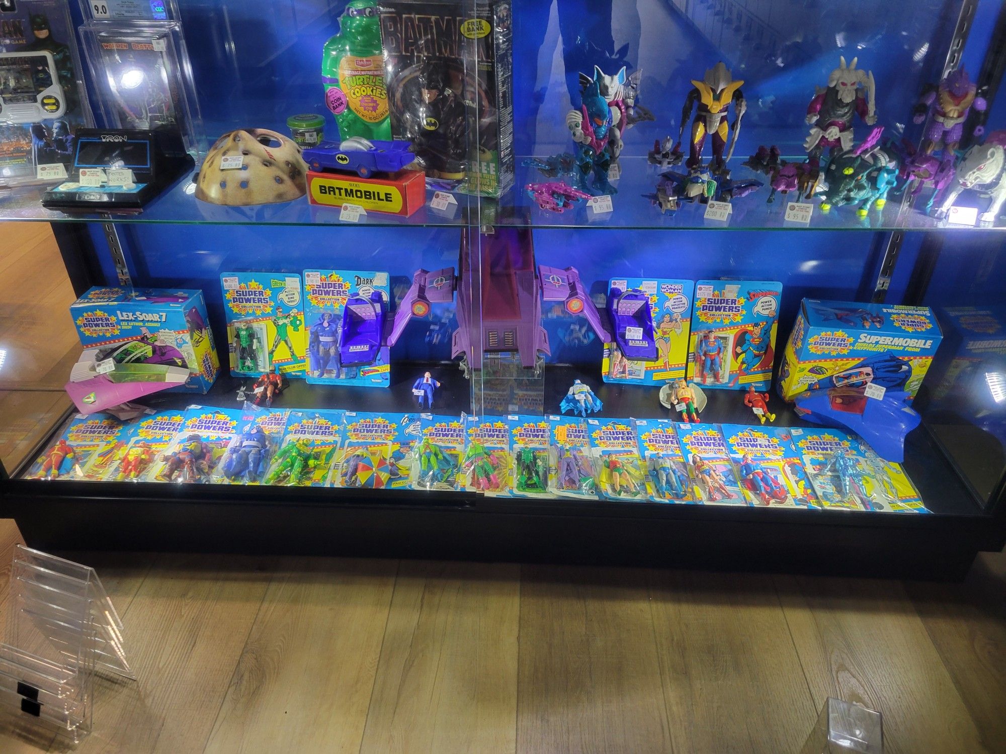 Display of DC Super Powers figures and toys from 1984 and 1985