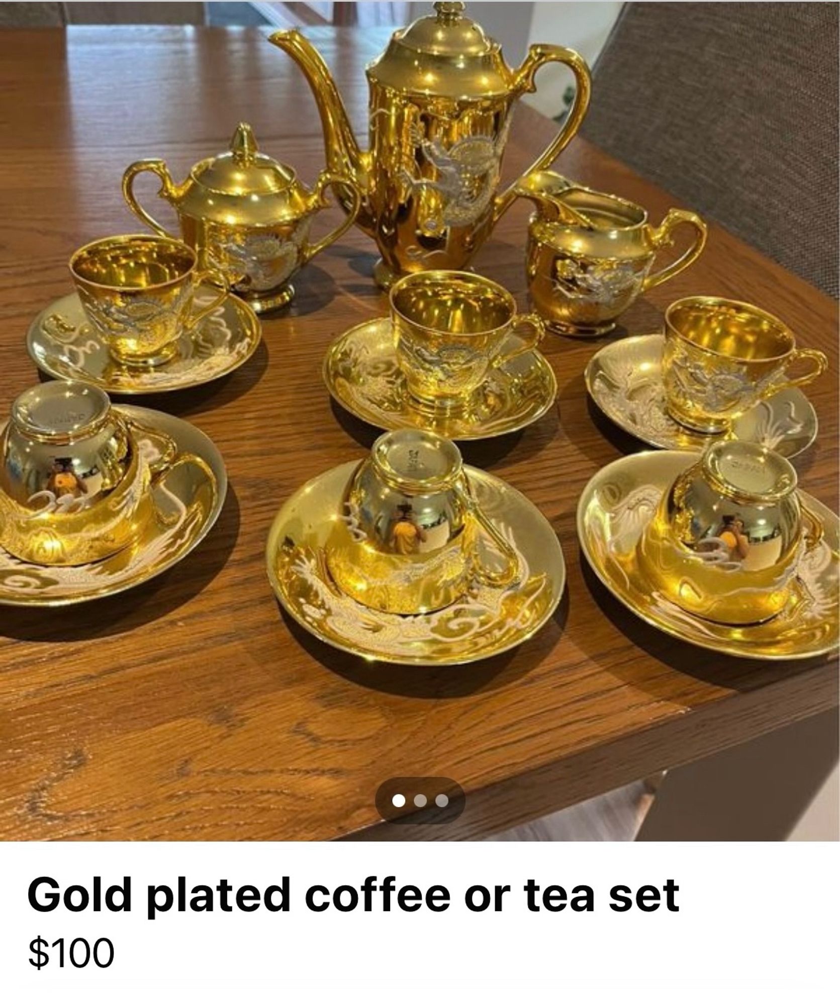 Cups, saucers, coffee pot, milk and sugar thingies – all completely gold