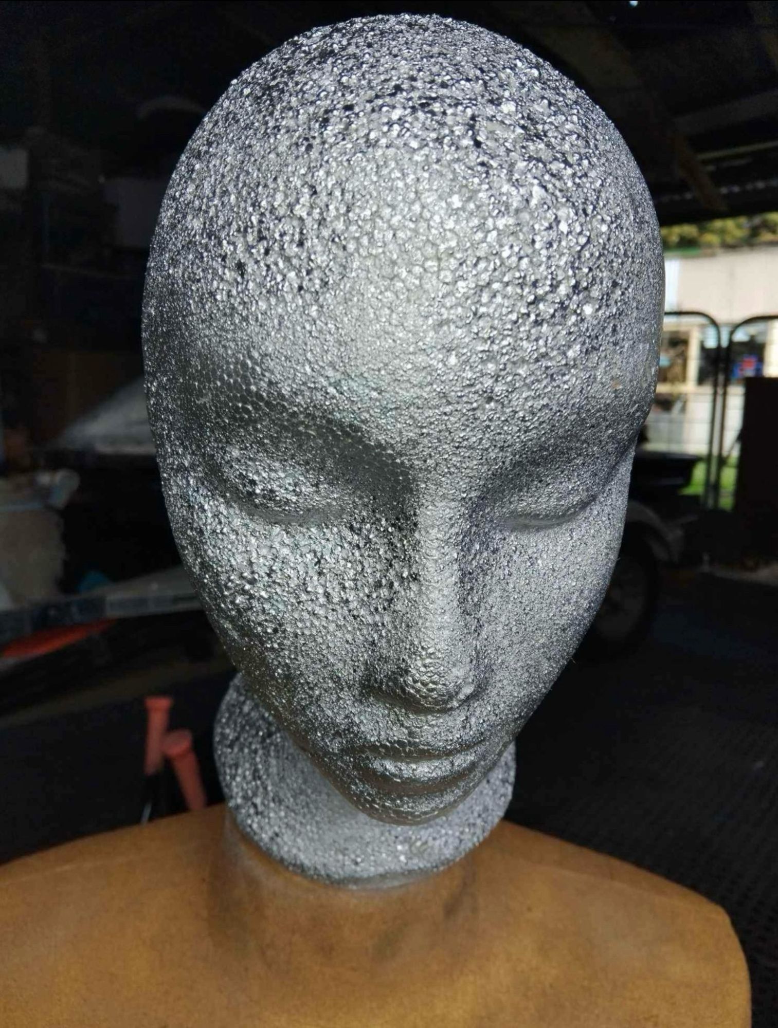 Spotty silver mannequin head