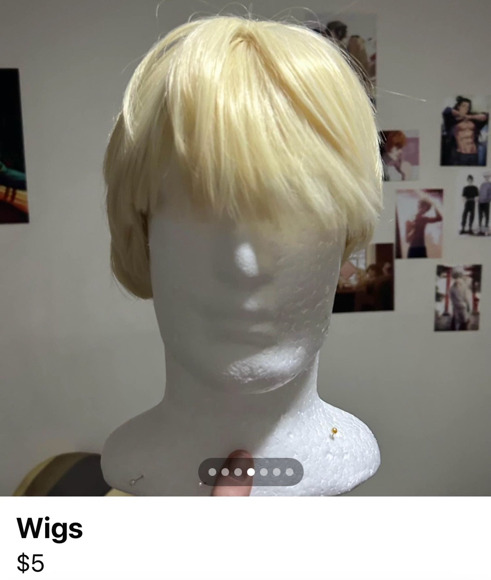 Polystyrene mannequin head with a short blonde wig