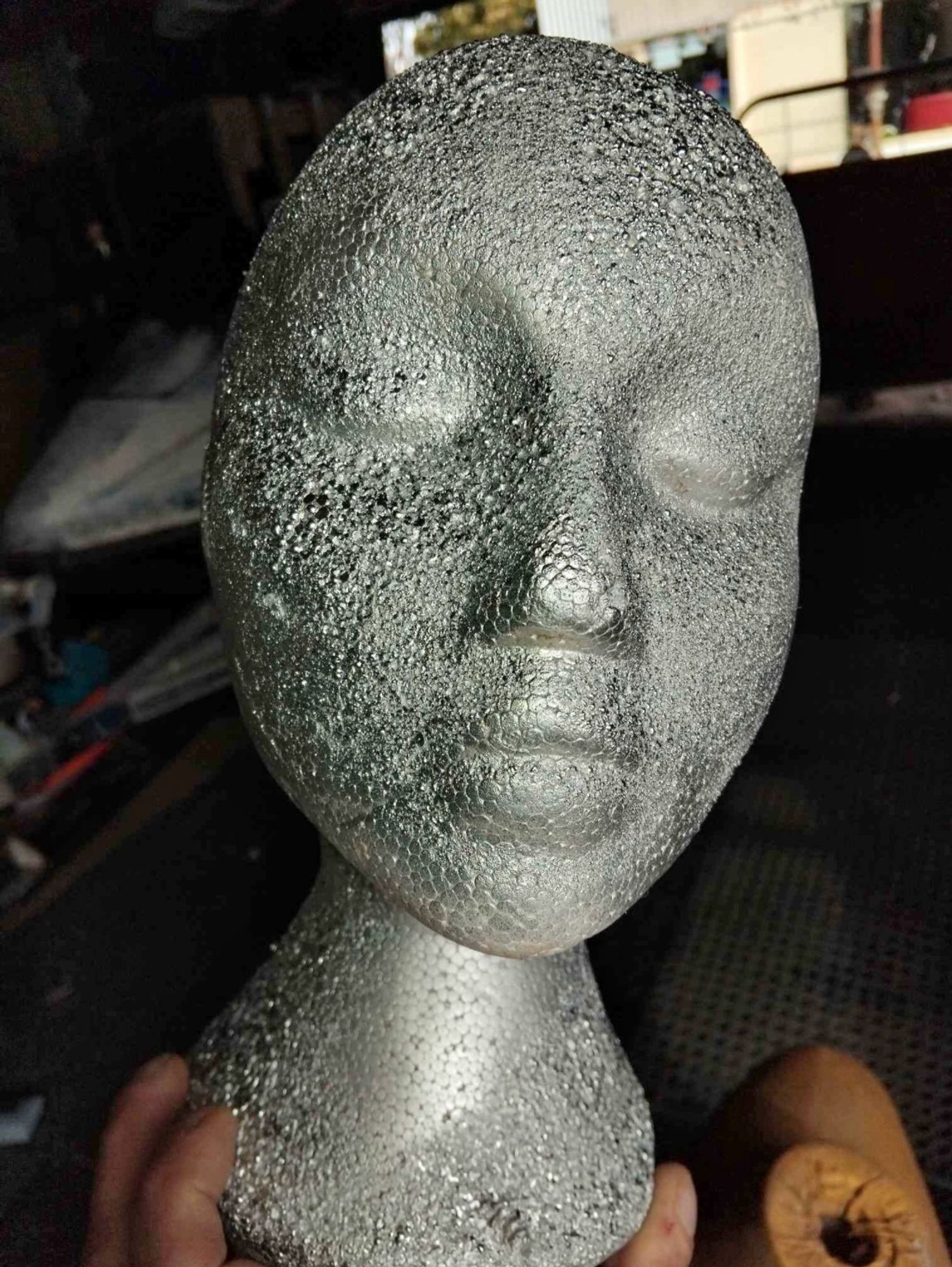 Spotty silver mannequin head