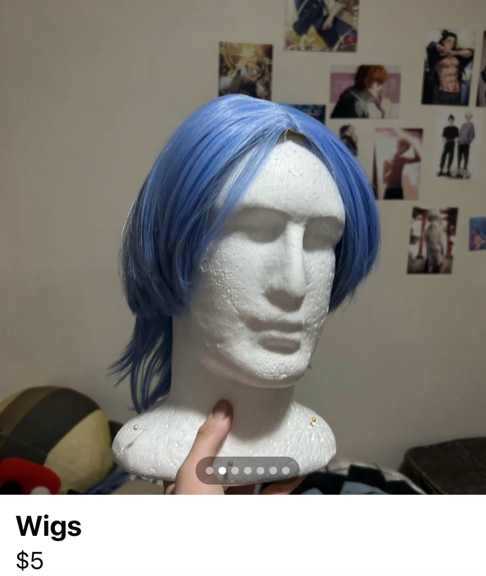 Polystyrene mannequin head with a blue wig