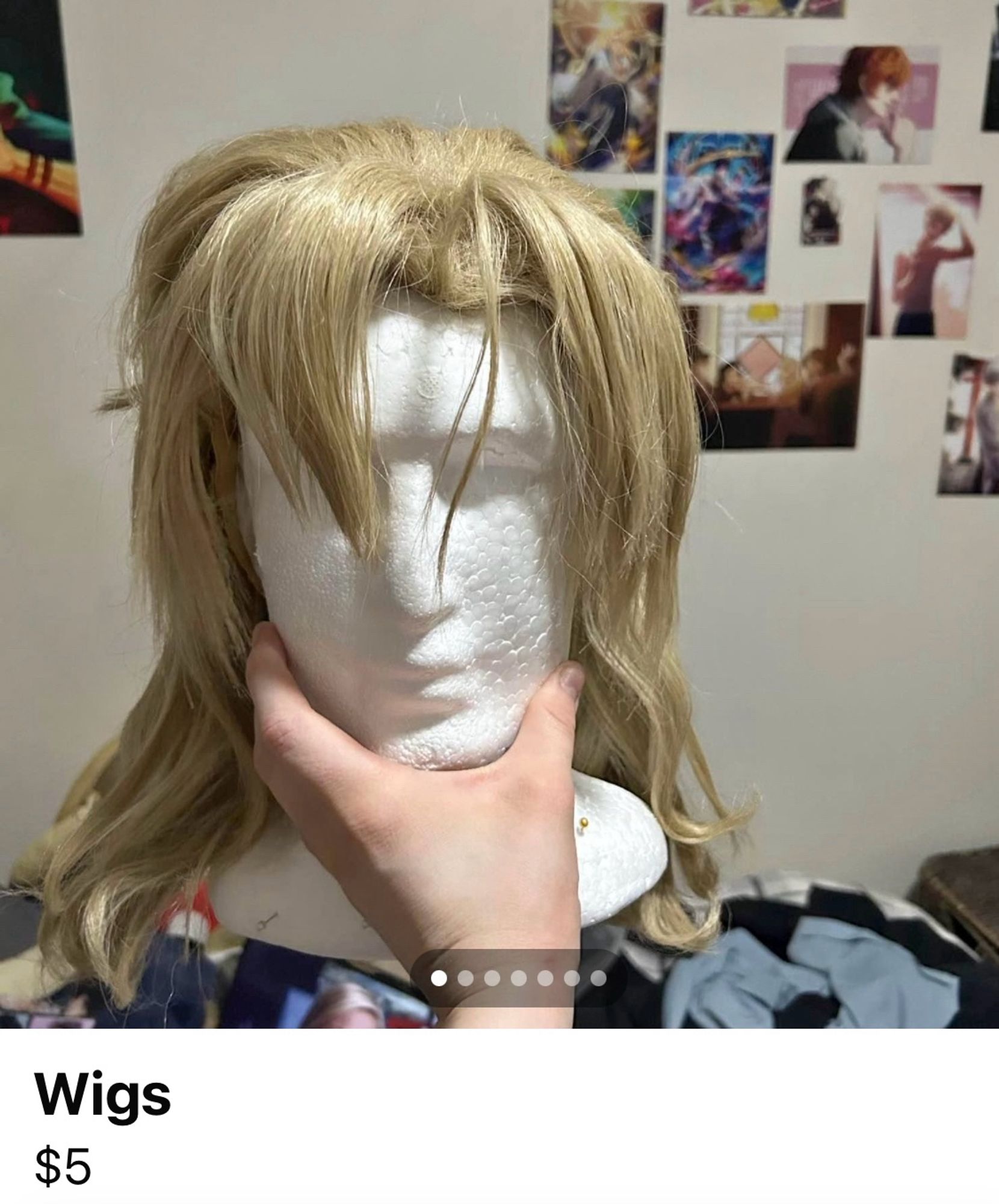 Polystyrene mannequin head with a long blonde wig