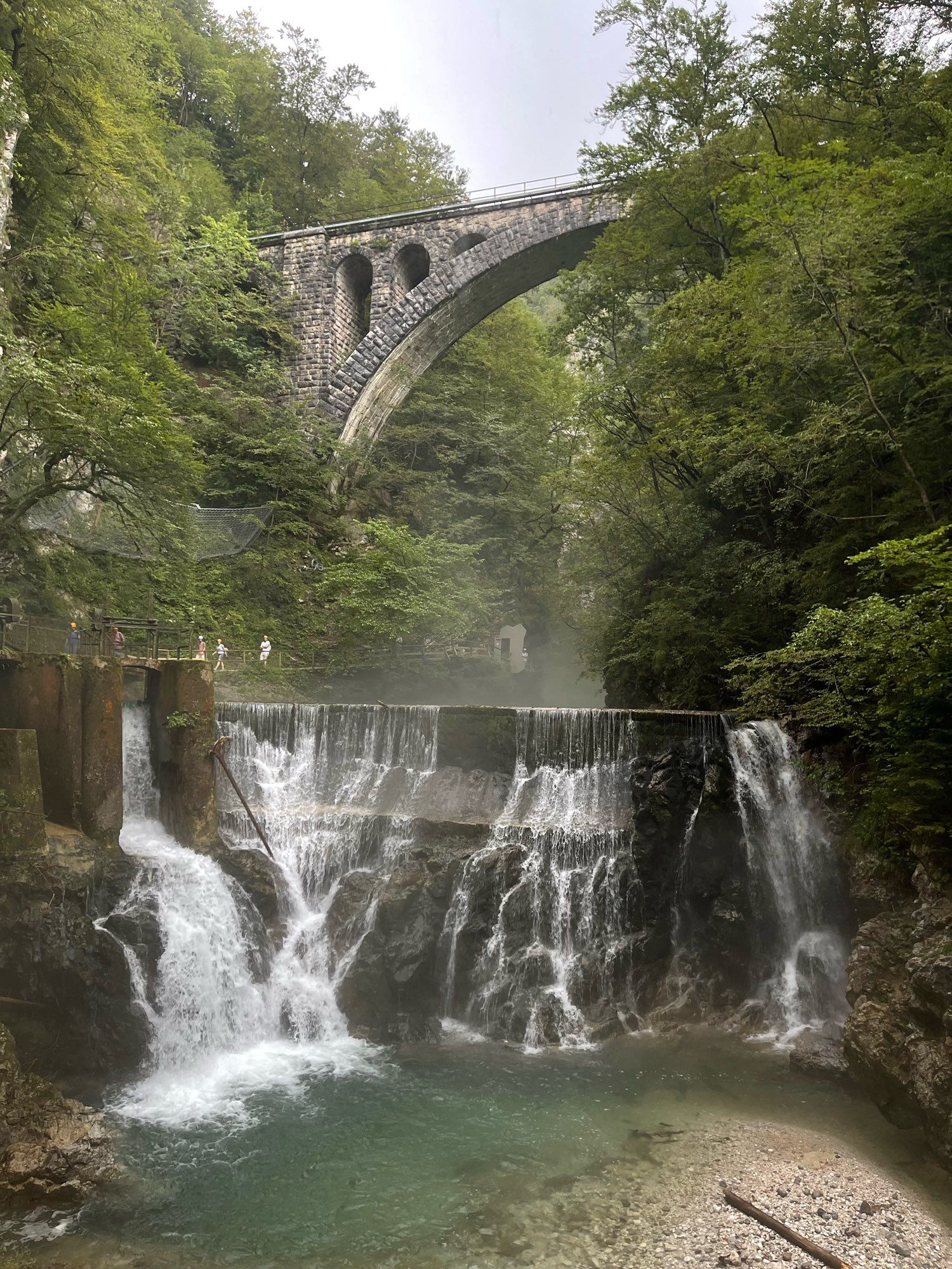 Bridge and waterfall at Slovenia's Vintgar gorge.