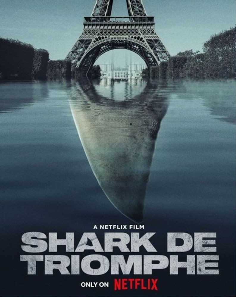 An alternate poster for Under Paris shows the shark's fin as the reflection of the Eiffel Tower and the alternate title SHARK D'TRIOMPHE