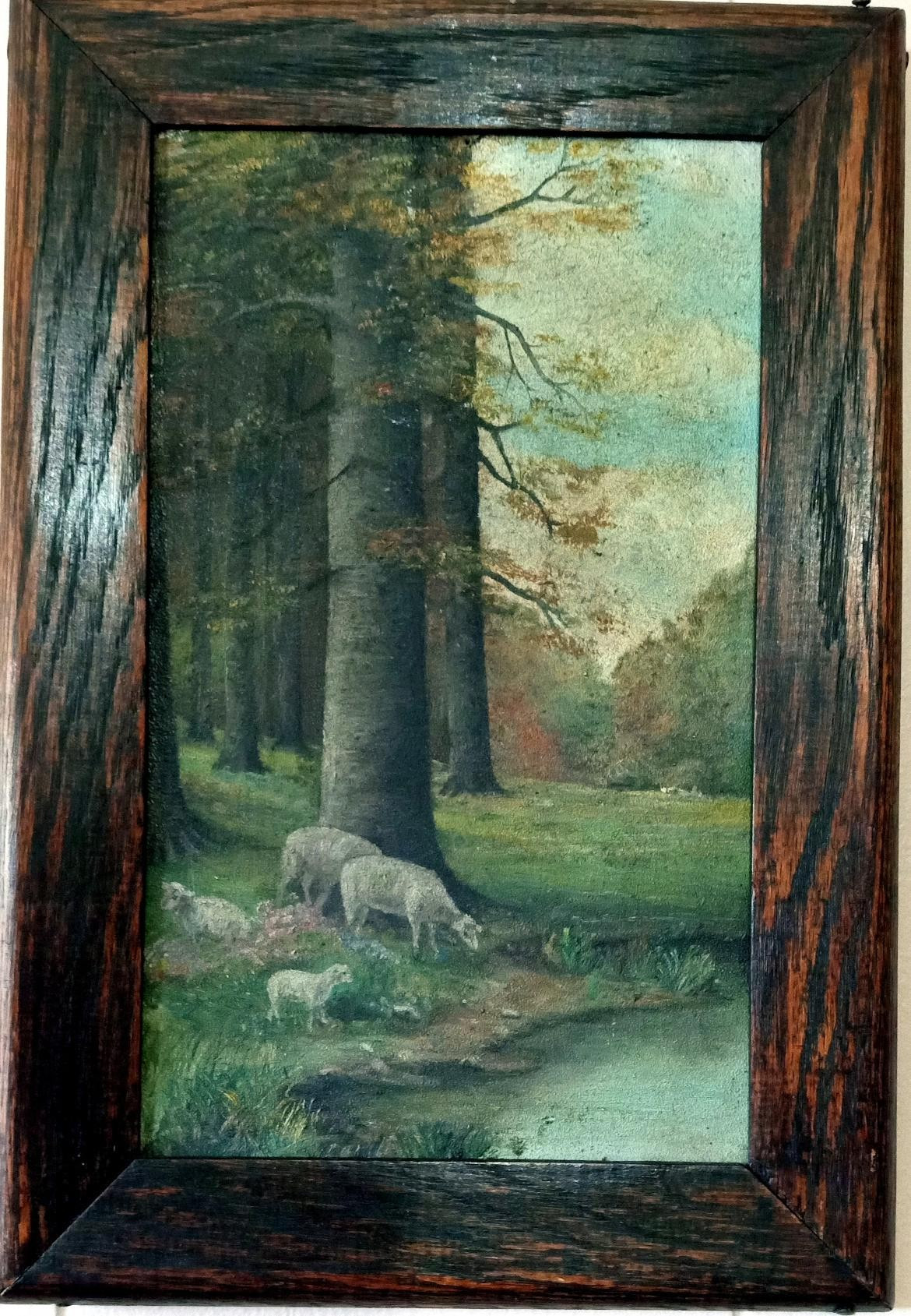 A painting of sheep by water with a wooden frame.