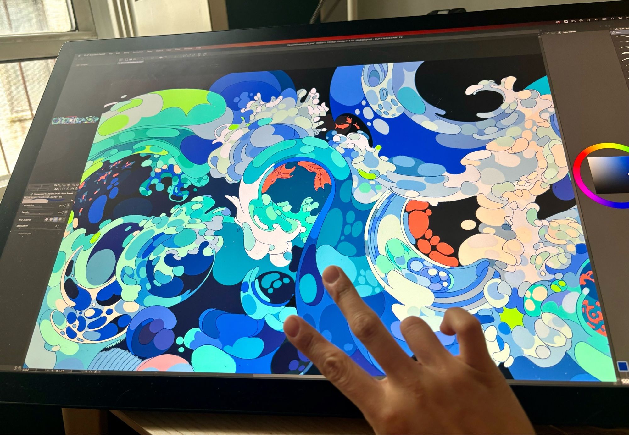 Cintiq pro screen with a WIP of crashing waves