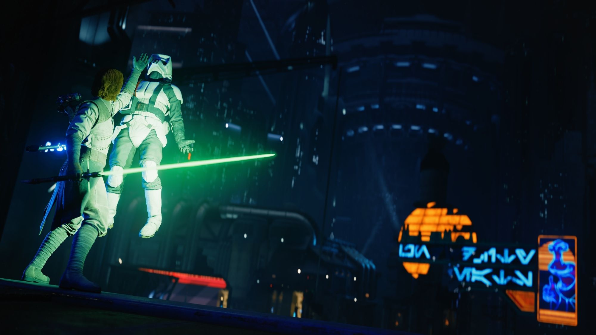 The image depicts a dramatic scene from the video game "Star Wars Jedi: Survivor." Cal Kestis, a Jedi Knight, is using the Force to hold a Stormtrooper above the edge of a building on the bustling planet Coruscant. The city's towering skyscrapers and neon lights are visible in the background. Cal's lightsaber is ignited, casting a green glow on the scene. The Stormtrooper is struggling, trying to break free from Cal's grip.