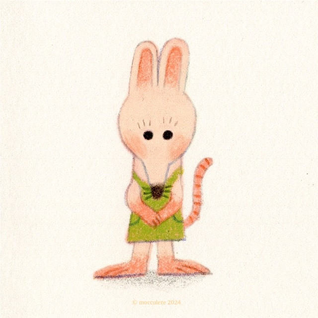 A mouse, wearing a light green dress, is looking at you with her big eyes.