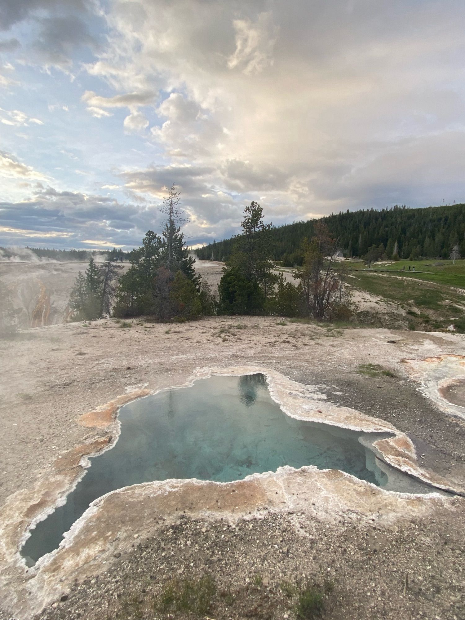 3 photos of hot pools at Yellowstone National Park