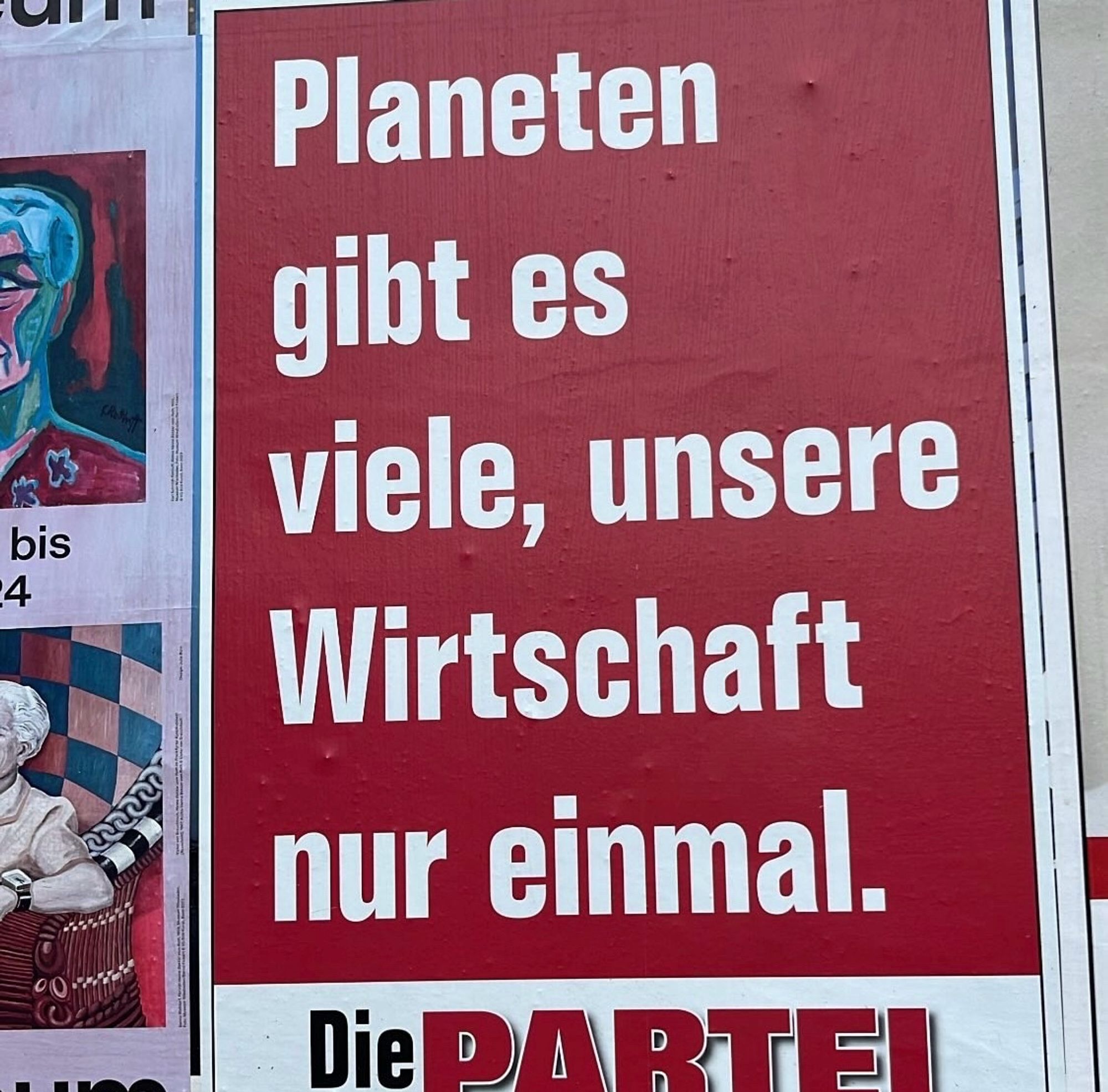 Slogan: „Planeten gibt es viele, unsere Wirtschaft nur einmal.“